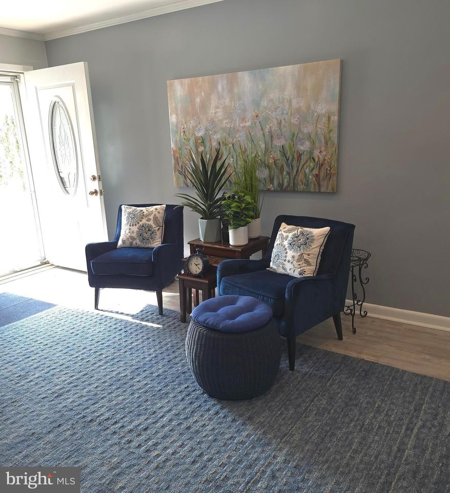 Welcome home! This expertly maintained and updated air-light home is ready for it's new owner.  With 3 bedrooms, 1 & 1/2 baths, generous outdoor spaces in the front and rear (including off street parking for at least 2 cars), new HVAC in 2025, painted in a calm nautical color pallet all you need to do is pack your bags and call the mover!  This location has lots to love as well, with easy access to the Tacony Palmyra bridge, Roosevelt Blvd, I95 and public transportation, shopping, dining, and services, while being tucked on a pleasant, wide block with parking on both sides of the street.  You won't want to miss this one! Schedule your appointment today.