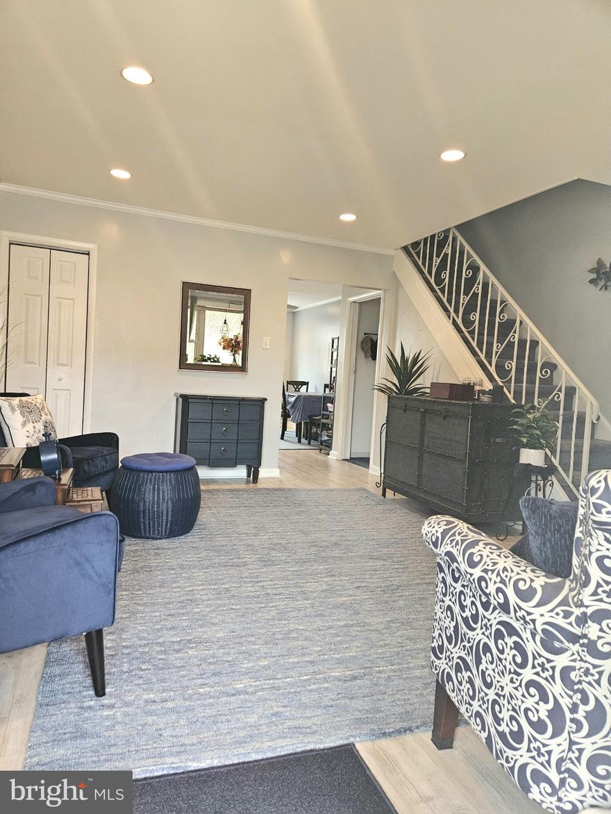 WELCOME to your new turn-key move-in-ready Mayfair home! As you walk along the path of your extended lawn, you will be deciding what to grill on your covered front patio.  Walking in your front door, you will instantly notice the LVP flooring, new ceiling with updated lighting and crown molding throughout the main floor.  With the light-colored walls, along with BOTH living and dining room bay windows plenty of natural light shines through.  In the kitchen, the chef has plenty of cabinets, counter space and stainless steel appliances to work with.   Main floor 2 piece bathroom is updated with ceramic flooring.  2nd floor offers a primary bedroom with 3 generous closets for clothes and storage.  Main bathroom is finished with ceramic floor and shower, along with custom linen closet and quartz countertop.  Head down to the finished basement/2nd living room/TV room with LVP flooring, new walls, ceiling and updated lighting.  The separate, enclosed laundry room has ceramic floor, new HVAC (2025), washer, dryer, and 40 gal. hot water heater (2024).  Your reserved parking has motion light for convenience and safety.  Location? Close to all major transportation routes, grocery and pharmacy.  If you find that you love everything about this home, but there's that one thing you'd want to change/upgrade; Seller is also offering a $3,000 CREDIT towards an upgrade of buyer's choosing.  Think about this credit going towards new countertops, paint, carpet, etc...Visualize yourself in your new home!