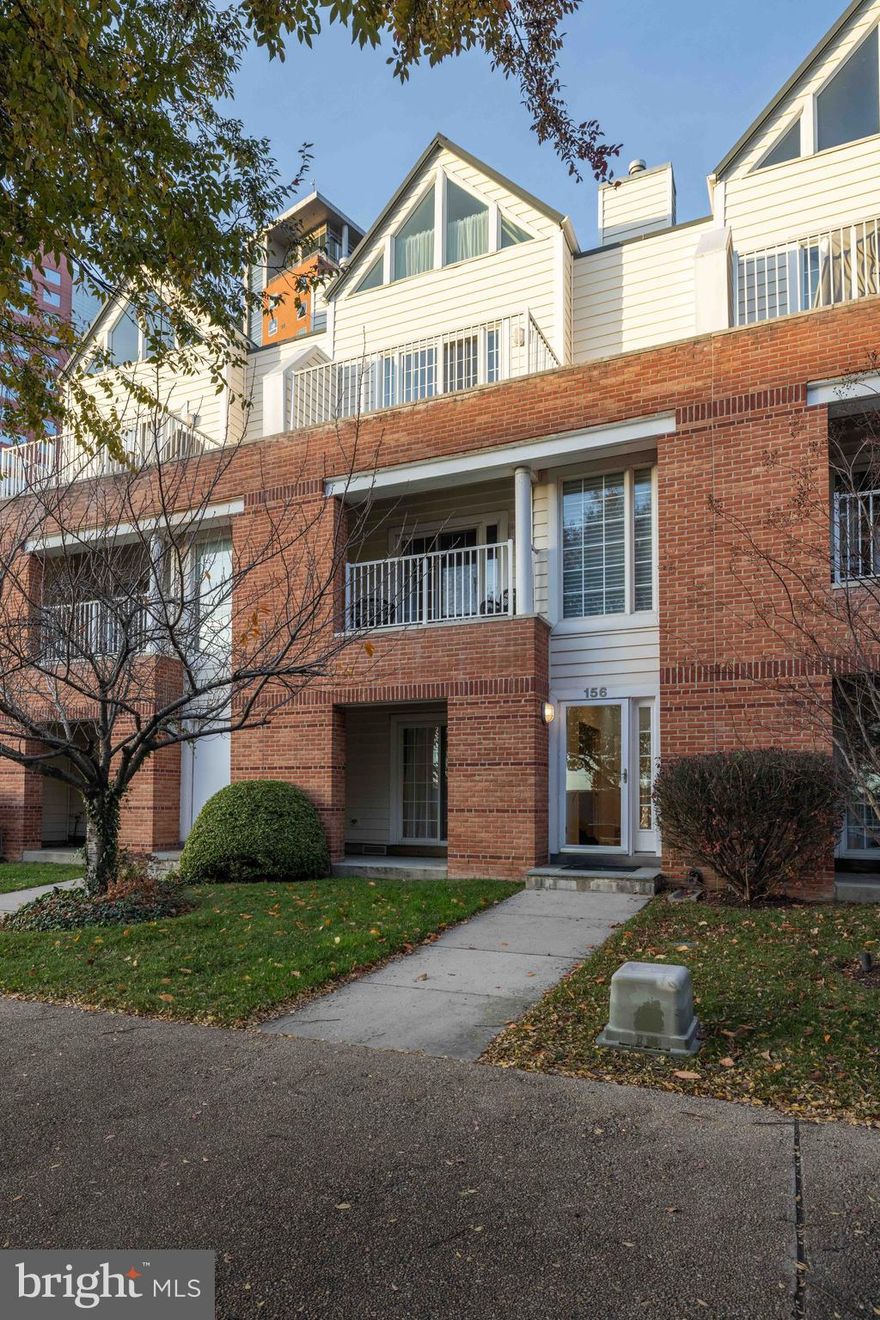 Christina Landing TownHomes, Located in the Heart of Wilmington City RiverFront East. Convenient to Everything, - Interstates, Center City Business District & Merchant District, Assortment of Parks and Walking Trails, The Movie Theater Complex, Sports Stadiums, Health/Fitness Centers, Medical Facilities, Coffee Shops and a Wide Assortment of Bars & Restaurants. This Well Cared for Contemporary Townhouse with 2,400 Sq Ft of Open Living Space is ideal for Entertaining. The Entry Level has a Foyer with a Hardwood Floor. Also on this Level is the 3rd Bedroom with Balcony Access and a Full Bath. This Bedroom can easily be used as a Home Office, In-Law Suite or Family Room. Behind the Foyer is the daily entryway with Ample Storage Closets, Utility Closets and convenient access to the 2 Car Garage (w/ Door Opener & 220V Outlet Electric Car Charging) and Crawl Space Storage. The Main Level above has a Spacious Living Room/Dining Room Combo with Hardwood Floors and 9’ Ceilings. There is a Gas Fireplace and an Entertainment Center w/ Built-ins and Floor to  Ceiling Wall to Wall Stationary Window allowing for ample Sunlight. The sliders in the Living Room lead to the Front Balcony. The Kitchen is a Cook’s dream w/ Solid Wood Cabinetry, Granite Countertops and a Large Center Island. There are Stainless Steel Appliances (New Refrigerator in 2021, Microwave 2024, New Garbage Disposal in 2021), Double Sink, Pantry Closet and a Spacious Eating Area. There is a Guess Powder Room on this Level and a Large Storage Closet that can be made into a Wet Bar. Upstairs is the Private Owners Suite with a Cathedral Ceiling (Ceiling Fan/Light), Stationary Wall Window and Sliders to Owners Balcony. There is a Large Full Bath with a Tile Floor, a Vanity w/ Double Sink, Tile Stall Shower and Charming Antique Style Soaking Tub on Legs. Ample Storage can be found in the Walk-in Closet and a Double Closet.  The 2nd Bedroom has a Vaulted Ceiling with Fan/Light, Walk-in Closet and a Full Bath. The Laundry Closet is Located off the Bedroom Hallway with Front End Washer and Dryer installed in 2022. The Floor Design of this Home Allows for Elevator Installation. The Hot Water Heater was Replaced in 2022. The RiverFront and Christina Landing is an Active Community Year Round & the Best Spot in the City of Wilmington for Fireworks Displays! FINANCING: Property Qualifies for PNC Bank 7.5K Grant Program.