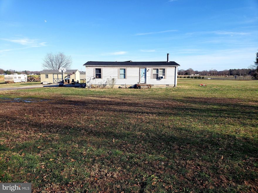 Ready to build your dream home?!?   Well here is a perfect 3 acre lot with a well and septic already in place!!!     The entire 3 acres is flat, cleared and open!  Or there could be some great rehab potential here, you decide.  Perfect location inside of Leonardtown High School and Leonardtown Middle School district.  This is a double-wide with an addition built off the rear which is a large living room area.  Brand new roof put on last summer.  Also includes a wood stove.  The choice is yours rehab or build new!!   Home sold strictly AS IS.