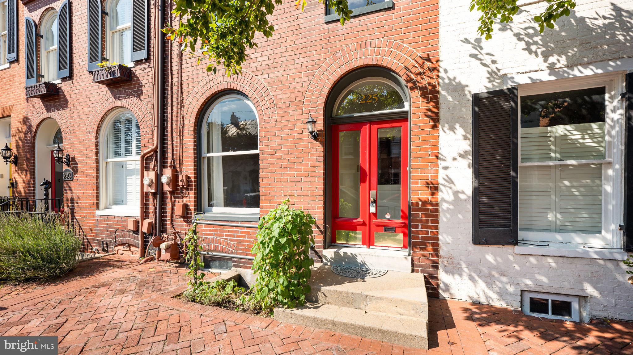 Ideally Located in the heart of the Historic District and steps from Shab Row, 2 blocks to Carroll Creek Promenade, many shops, restaurants and a short stroll to Baker Park - a 58 acre park with jogging and bike paths, playgrounds, a lake, tennis, swimming and more including events, concerts, festivals, and recreational activities in the heart of Historic Downtown Frederick. This home has been lovingly restored with newer kitchen and baths, newer central air, re-built rear porches, repointed stonework in the basement and the list continues. Original architectural details intact include arched window, doorway, exposed brick walls, original hardwood floors, and a walled rear garden oasis in the midst of the city. This welcoming home is flooded with light, charm and is ready to host many years of sought-after downtown lifestyle.