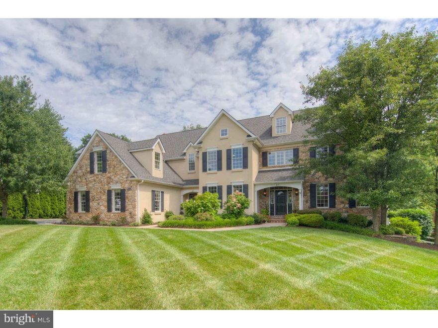 NO BEACH HOUSE. NO POCONO HOUSE. NO PROBLEM........welcome to PARADISE!! This absolutely stunning property has it all and there is no reason to wish for a second home, as from the moment you arrive you will never want to leave. This gracious 15 year young home, has 5/6 Bedrooms with 6 Full and 2 Half Baths and a backyard oasis that is guaranteed to provide many priceless memories. The grand 2 story front-to-back Foyer is flooded with natural sunlight and gracefully flows into the formal Living and Dining Rooms. A handsome Library with mahogany built-ins provides a wonderful home office that opens to the magnificent back deck. The family center has a spacious gourmet Kitchen that naturally flows into a step down Great Room with fireplace and coffered ceiling, and Breakfast Room that overlooks the magnificent backyard setting. This family friendly space continues as it opens to a covered deck area outfitted with ceiling fan, surround sound and outside tv sure to be a family favorite.  The First Floor is completed by a formal and informal Powder Rooms, back stairs,and a Laundry/Mudroom area that provides access to the three car attached Garage. The sweeping Foyer staircase leads one to the lovely Master Suite with Sitting Area, two large walk-in closets, and luxurious Master Bath. There are two additional En-Suite Bedrooms, and two more Bedrooms with a Jack and Jill Bath. The Third Floor is also finished and would be perfect for an au-pair and/or in-laws. The finished Lower Level is ready for a party as it is completed outfitted with a bar, dance floor, pool table area, in-home Movie Theatre Room, full Bath,and Exercise Room that walks directly out to the breathtaking Pool area. This home is an entertainers dream both inside and out, and sits on the most private and breathtaking  lot in the sought after community of the Reserves at Spring Meadow.... a true treat to see...don't miss it!!