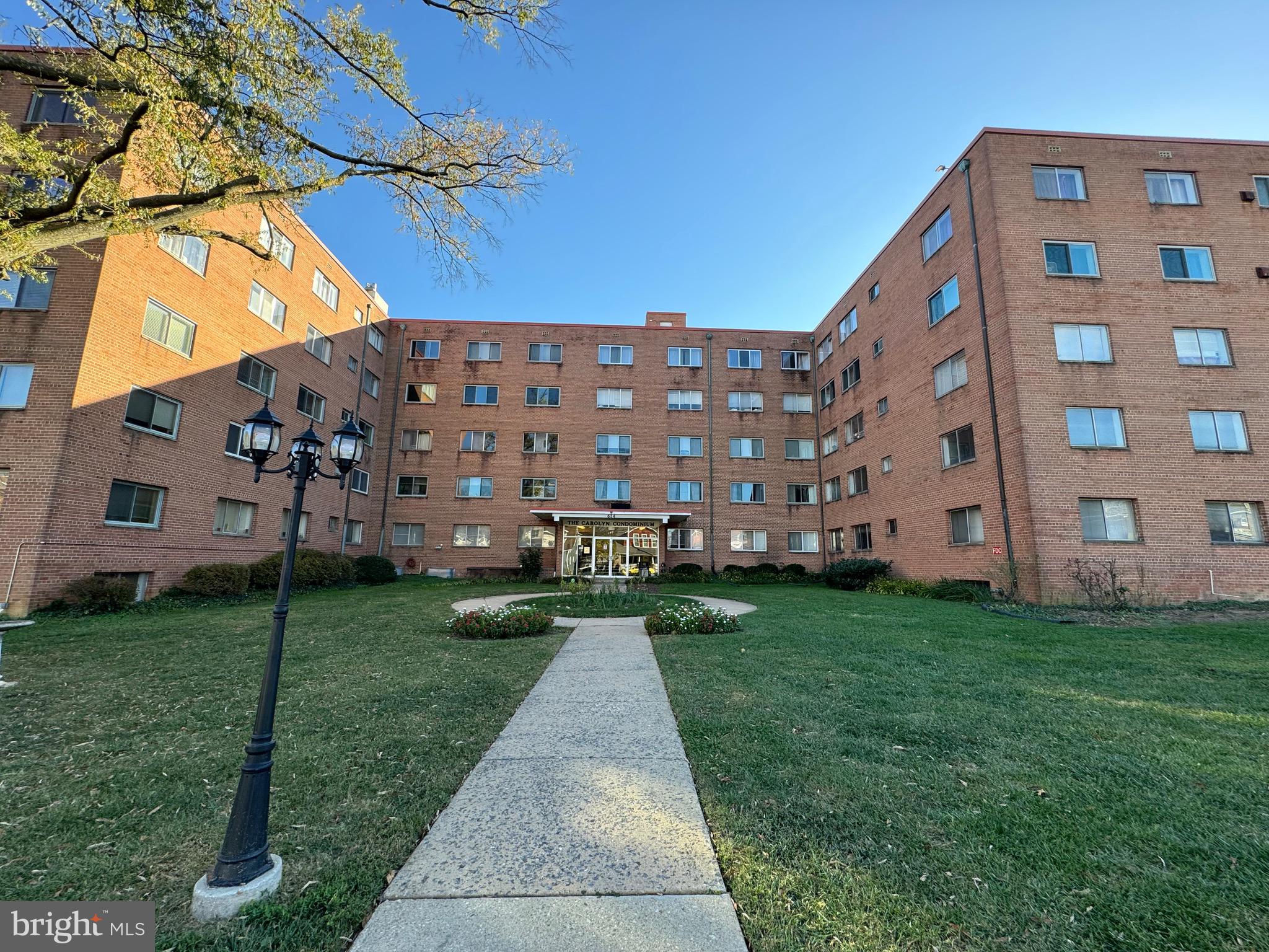 Welcome to 614 Sligo Avenue, Unit 309 – a beautifully renovated 2-bedroom, 1-bathroom condo offering a bright and airy living space. Located on the top floor, this updated unit features a private balcony and assigned parking space. Recent upgrades include luxurious wide-plank vinyl flooring throughout, brand-new windows, three air convectors, recessed lighting, and updated doors and hardware. The open-concept dining and living areas are perfect for entertaining, with a sliding glass door leading to the new balcony. The modern kitchen boasts quartz countertops, a stylish tile backsplash, stainless steel appliances, and sleek wood cabinets.
Down the hall, you’ll find the spacious primary bedroom, complete with ample storage and room for a king-size bed. The second bedroom is generously sized as well, and both are conveniently located next to the full bathroom.
This home is ideally located near public transportation and the metro, just minutes from downtown Silver Spring. The condo fee covers all utilities, making for a hassle-free living experience.
