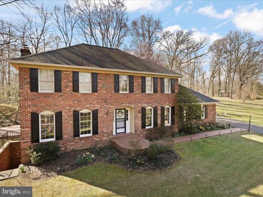 Welcome Home!!!Nestled on over an acre of lush land, this charming residence boasts privacy and tranquility. A long private driveway leads you to the all-brick home, enveloped by majestic trees that offer a natural screen from the outside world. As you approach, the views open up to reveal a serene pond and  park-like setting beauty to the landscape. A brick sidewalk from the driveway leads you to the front door of this beauty. 
 The spacious interior features four bedrooms and two and a half bathrooms, providing ample space for comfortable living. A spacious walk up finished basement with a rec room, wood burning stove, den/hobby or zoom room adds to the charm of the beautiful home. 
This freshly painted home exudes elegance and warmth with its gleaming hardwood floors that span throughout. The heart of the home is the open kitchen, with granite countertops and complemented by stainless steel appliances, offering both functionality and style for culinary entertaining. 
The bathrooms have been thoughtfully updated, featuring modern amenities and tasteful finishes that enhance the overall ambiance of the home.
A wood-burning fireplace, complete with a mantel, serves as a focal point in the family room area, and it's open to the kitchen for entertaining. 
A screened-in porch off the family room  offers relaxation and al fresco enjoyment, providing a tranquil retreat to soak in the surrounding natural beauty which leads to a charming brick patio. 

Some of the updates and features  include: No HOA, Crown molding and Chair rail, Gutters with leaf guards 2023, Hip roof 8 years old, well pump 2023, septic tank pumped 2023, new carpet @ basement, new paint throughout, updated bathrooms.
Super convenient location, close to the VRE, Old Town Manassas, Shopping and Commuter routes.