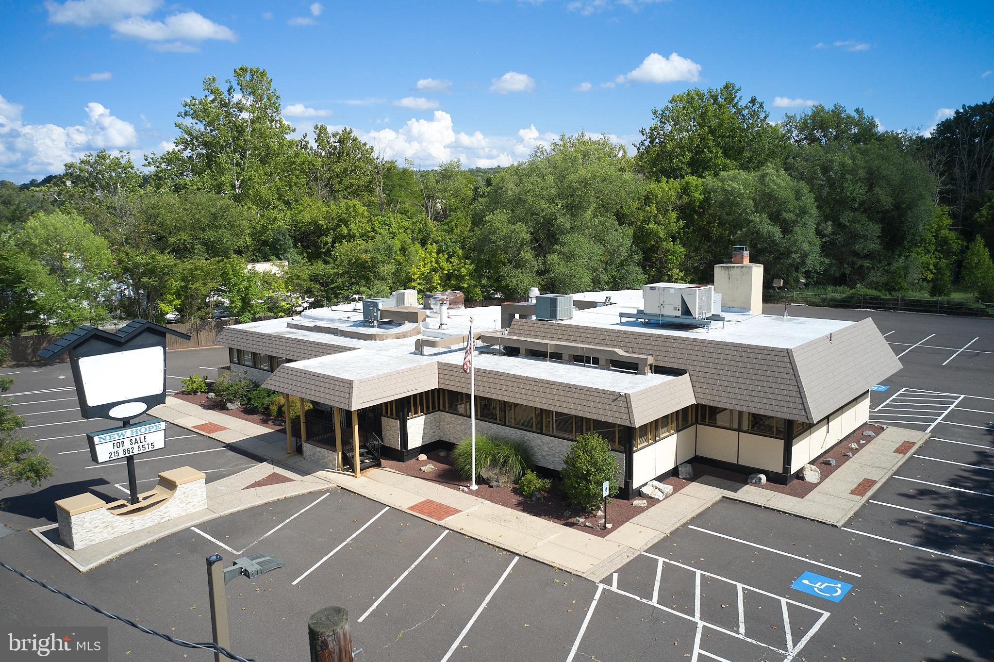 The New Hope Family Restaurant is the iconic and life long staples in one of the most desired small towns in Pennsylvania. This beautiful property features over 5800 square feet of usable restaurant space. The building offers 4 large dining rooms with seating for over 180 people. You're greeted with a bar area with large booths which is perfect for a relaxed dinner or lunch. In the main dining room, diners can enjoy the ambiance of a comforting, large fireplace. This restaurant is perfect for serving breakfast, dinner as well as large parties and events. The kitchen is equipped to serve hundreds of customers daily. All major kitchen equipment is included in the sale. The property did have a liquor license at one point. With over 80 parking spaces and plenty of dining seating , this is the perfect location to operate the best restaurant.