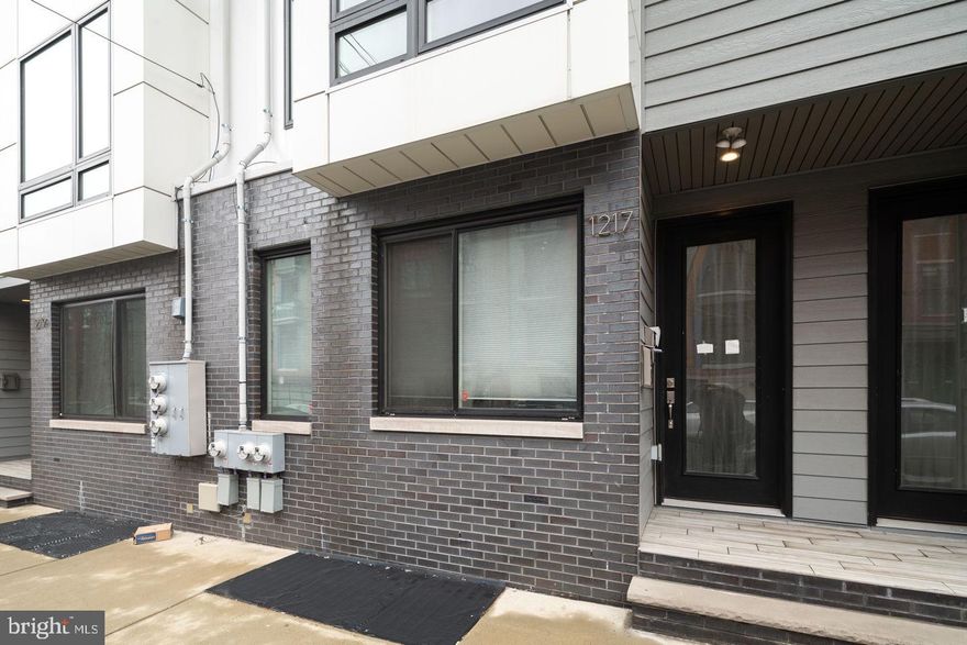 Luxury living in South Kensington with parking! Prime location right off of Girard Ave. with walkability to all the retail, restaurants, and nightlife Northern Liberties AND Fishtown has to offer. This bi-level 2 bed, 2 bath condo 2 comes with  PARKING and about 7 years left on the tax abatement! On the main floor of this duplex, you will notice the beautiful finishes in the kitchen with stainless steel appliances, beautiful countertop, and plenty of cabinet space as well as a large kitchen peninsula allowing for additional barstool seating in an open concept living/dining rooms. This layout gives a nice flow to entertain your family and friends! Conveniently on this floor is a bedroom and a full bath. As you head downstairs to the lower level you will find a gigantic living room/ flex space!  The Owner's Suite is also located on the lower floor. A massive bedroom with a walk-in closet is accented by the master bath with double sink vanity and glass frameless shower stall. Call today to scheudle a tour!