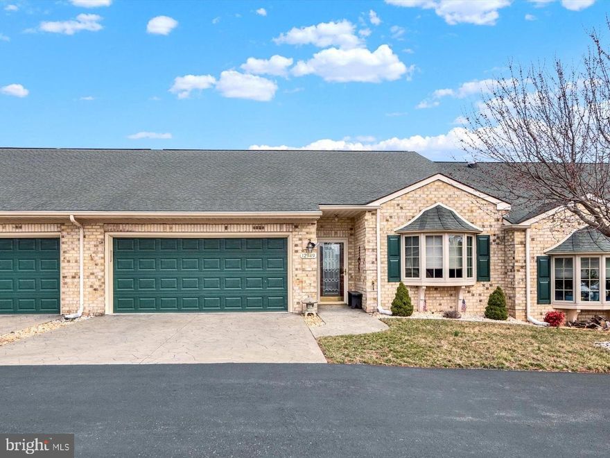 Charming Villa-Style Rancher with 1-Floor Living

This beautifully designed 2-bedroom, 2-bathroom villa-style rancher in the desirable Cortland Manor community offers the perfect blend of comfort and convenience, all with the luxury of one-floor living. Situated on a quiet street, the home features an inviting stone front and back, adding timeless curb appeal. 

Step inside to an open floor plan where spacious living and entertaining areas await. The large living room flows seamlessly into a combined kitchen and dining room, perfect for both daily living and hosting guests. The kitchen boasts stunning oak cabinetry, sleek granite countertops, black appliances, and a convenient desk area for meal prep or work. Adjacent, a cozy family room with two sliding doors leads to a versatile bonus room that could easily serve as a third bedroom, office, or den, and opens to a stone patio perfect for outdoor relaxation.

The primary bedroom offers ample space with a tray ceiling and two large closets, providing plenty of storage. The en-suite primary bathroom completes the space. Throughout the home, the high ceilings, luxury vinyl plank flooring and crown molding add a touch of elegance, complemented by fresh, neutral paint.

Additional highlights include a large 2-car garage with attic access, extra driveway parking, and a well-maintained exterior. These 2 car units are hard to come by. This home provides a comfortable and functional lifestyle with an abundance of potential for customization.

Don’t miss the opportunity to make this exceptional property your new home!