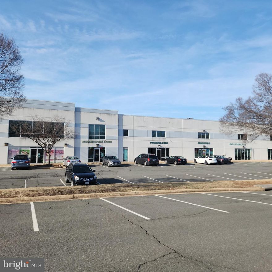 Great Location! Retail/office warehouse condo fronting on Beaumeade Parkway w/great visibility. Suitable for showroom/retail/office/storage,light manufacturing and much more. Immediately available and rear truck loading dock.  20ft Ceiling allows create more space w/mezzanine. Closed to future ONE LLOUNDON & World Trade Center. Tremendous potential!