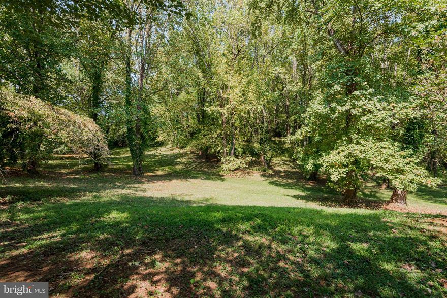 MAJOR PRICE REDUCTION !!!  THIS IS AN AMAZING PROPERTY!!! Huge is not a big enough word to describe this home.  Located on a large 3.92 Ac surrounded by peace and tranquility .  This home needs work but has so much to offer .  Including oversized garage, screened porch  and in-ground pool and much more .