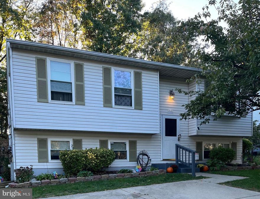 Welcome to your dream home! This spacious 4-bedroom, 2-bathroom bi-level home offers a perfect blend of comfort, style, and convenience. Step inside and see this open living area with natural light and modern finishes. Large kitchen with granite countertops along with stainless steel appliances and ample cabinet space.  Dining area also plenty of space for entertaining.  Gorgeous laminate flooring in the kitchen, dining room, living room, and hallway which are durable and stylish!  There are 3 spacious bedrooms on the main level each with plenty of closet space as well as a full bath  with modern fixtures.
Private screened-in porches on both levels – perfect for relaxing or entertaining year-round.  Step down into the Cozy lower-level family room that is perfect for movie nights, gatherings or a media space, and still has  plenty of room for a home office. There is an additional 4th bedroom and second full bath on the lower level for added convenience.  The Laundry room/utility room has access to the lower level screened porch and fenced in back yard. The lower level would be great for in-law quarters or family member seeking their own private space. 
Located on a cul-de-sac, this home is  ideal for growing families or anyone seeking extra space!
Close to schools, parks, and shopping centers.  Easy access to public transportation and major highways
Quiet, well-maintained neighborhood with great community feel.