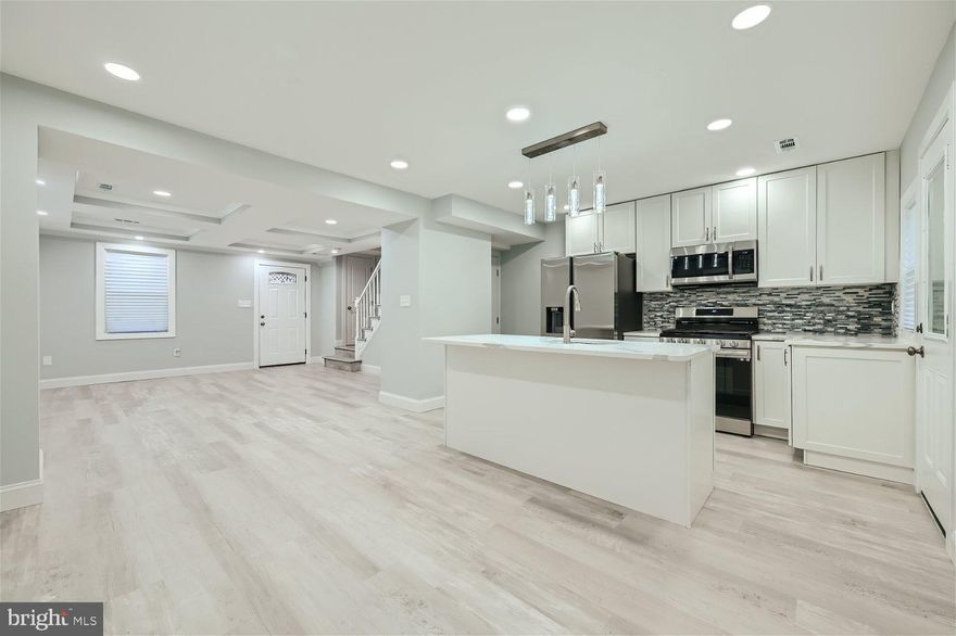 Welcome to 3714 Bowers Ave! This fully renovated, end unit townhouse is now available for sale. With 3 bedrooms, 2 bathrooms, and a bonus room in the basement.  The kitchen boasts beautiful quartz countertops and features all brand new stainless steel Samsung appliances, making meal preparation an absolute delight. All new luxury vinyl tile on main level and second floor that offers durability and easy maintenance. Recessed lighting throughout the main level for a bright welcoming entry. Brand new washer and dryer on the lower level.

This townhouse provides off-street parking for your convenience. Whether you have guests visiting or multiple vehicles, there's plenty of space to accommodate everyone comfortably.

The community is conveniently located near 83, 695 and Sinai Hospital. The transformation of 3714 Bowers Avenue is truly remarkable. Don't miss out on the opportunity to make this property your own. Contact us today to schedule a viewing and see firsthand why this townhouse is an exceptional choice for your next home.