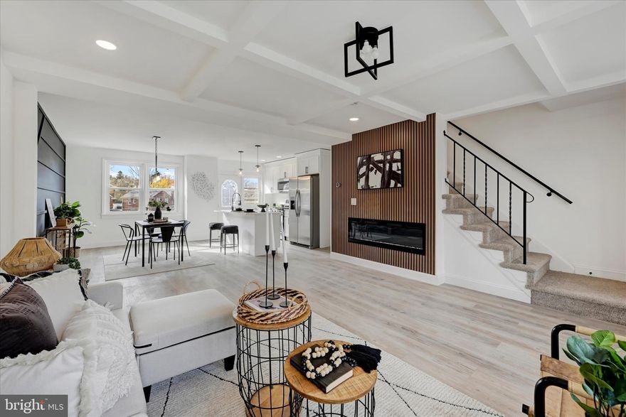 Welcome to 1230 Stamford Rd — a freshly renovated 4-bedroom, 2-bathroom townhouse featuring all the bells and whistles! Step inside to an inviting open-concept main level showcasing tray ceilings, a modern 60" electric fireplace, and stylish accent walls that add warmth and character. The stunning kitchen is equipped with stainless steel appliances, upgraded countertops, and sleek finishes, perfect for both everyday living and entertaining. Upstairs, you’ll find three comfortable bedrooms and a beautifully updated full bath. The fully finished lower level offers a rec room with 42" electric fireplace, spacious "true" fourth bedroom, and an additional full bathroom. The backyard offers a spacious porch that’s perfect for entertaining, along with a generous yard for outdoor enjoyment. Enjoy the convenience of rear parking pad and a prime location close to shopping, dining, and major routes.