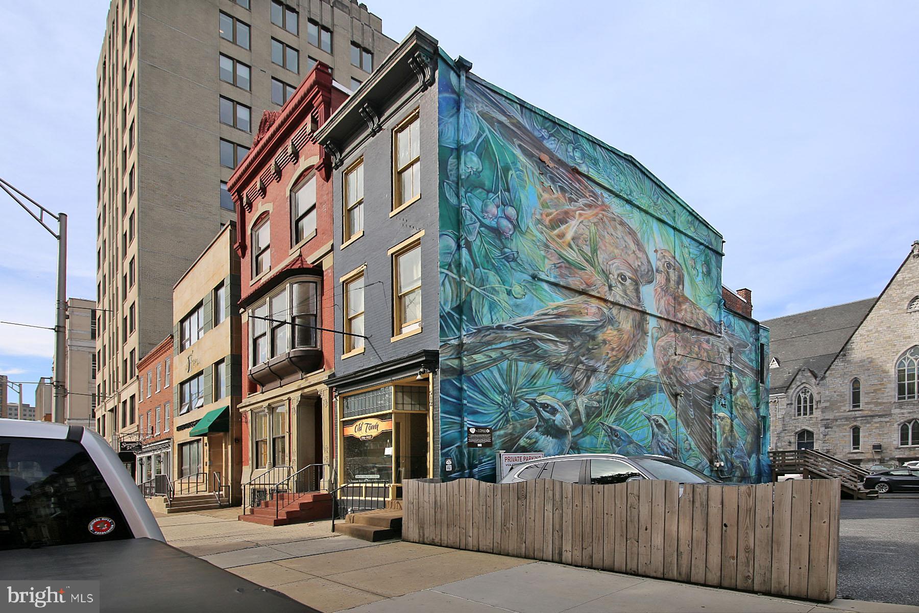 **NEW PRICING! $305,900 list price reflects REAL ESTATE ONLY - With contents of current deli and business, the price is $325,900**
Welcome to a unique opportunity in the heart of Downtown Harrisburg, directly across from the iconic Harrisburg Capitol Complex. This mixed-use property offers exceptional visibility, high foot traffic, and endless potential for your next business or investment venture.
The first floor is currently outfitted as a fully operational delicatessen, complete with all necessary kitchen equipment and an established, loyal customer base. This turn-key setup provides an ideal space for a new owner to hit the ground running, whether you wish to continue the deli's legacy or transform the space into your own vision.
Above, you'll find a charming 2-story, 1-bedroom apartment—perfect for an owner-occupant or as a potential rental property to generate additional income. With its central location, the apartment offers easy access to Harrisburg's vibrant downtown, drawing professionals, tourists, and locals alike year-round.
But that's not all—this property boasts an artful touch with a stunning mural on its side wall, painted by local artist Emily Ding as part of the Sprocket Mural Works initiative in 2019. The mural, which highlights the beauty and significance of the Kittatinny Ridge (Blue Mountain), adds a cultural and artistic flair to the property.
Whether you’re looking for a prime commercial space, a new home for your business, or a solid investment in a growing city, this property checks all the boxes. Schedule your private tour today and explore the possibilities in this exceptional downtown location!