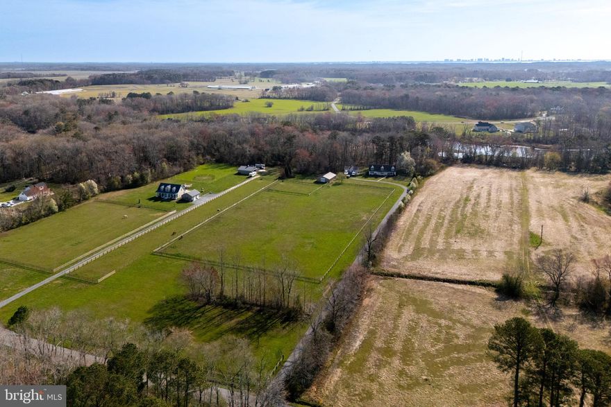 *Professional Photos Coming Soon*

Welcome to 12740 Jarvis Road!  A rare waterfront retreat set on 10.75 acres in Bishopville, MD. This spacious 4-bedroom, 3-bath home offers the perfect blend of privacy, open land, and direct water access.
Enjoy endless outdoor possibilities with a beautiful pasture stretching across the front of the property, ideal for horses, hobby farming, or simply taking in the peaceful surroundings (a new tin roof was put on the barn in 2023).  Out back, take advantage of your private waterfront lifestyle complete with a boat lift—perfect for boating, fishing, and exploring the nearby waterways. New boards on the dock in 2024 and new boat lift in 2025.
The home offers generous living space with a functional layout suited for both everyday living and entertaining.  Brand new HVAC System and a new septic pump installed 2025.  A detached 2-car garage provides ample storage for vehicles, equipment, or recreational gear.
Whether you’re looking for a full-time residence, weekend escape, or a property with room to grow, this unique waterfront estate delivers space, versatility, and the best of coastal country living.