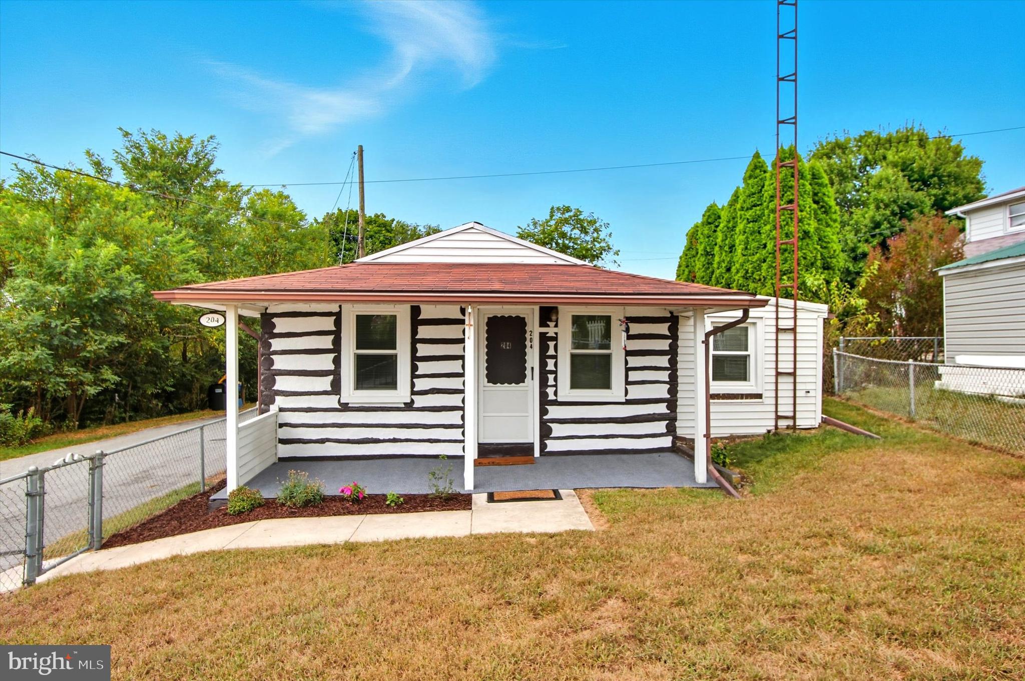 The best things really do come in small packages! This West York tiny house is huge on charm and proves that cozy living doesn’t mean compromising.! Affordable, efficient, and easy to maintain, it’s the perfect spot for first-time buyers, downsizers, or anyone who loves the idea of a simpler lifestyle!
*Bright, open living space with beautiful hardwood floors *Walk in closet *Bath features updated tile walk in shower with grab bars * 1st floor laundry * Updated furnace & water heater 2022 & Roof 2012 *Manageable fenced yard for pets, relaxing or gardening *Peaceful covered front & back porch and shed *Walking distance to shops, dining, and more! Whether you’re looking to invest smartly or settle into a snug, stylish space of your own, this tiny home delivers big value!
