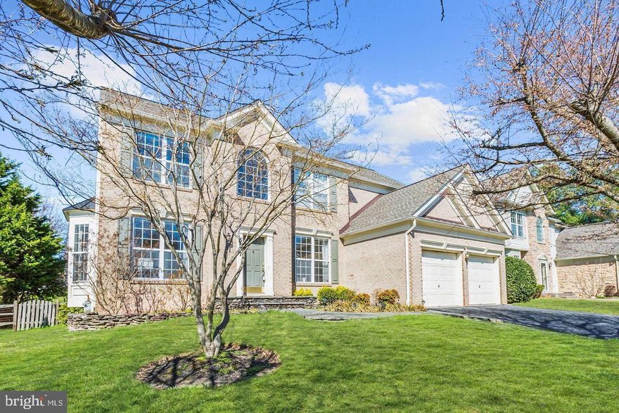 In the illustrious enclave of Clarks Glen, where refinement and prestige converge, stands this resplendent colonial masterpiece—an extraordinary opportunity to claim a residence where stately grandeur intertwines seamlessly with the comforts of gracious living. Beyond the commanding double-height foyer, a tableau of elegance unfolds: lustrous hardwood floors cascade through the main level, crowned by intricate moldings, distinguished chair rails, and artisanal box wainscoting that proclaim the home’s architectural pedigree. The formal salon and dining hall provide the perfect stage for sophisticated entertaining, while the gourmet chef’s kitchen reigns as the heart of the home, adorned with opulent granite surfaces, a bespoke decorative backsplash, a regal center island with breakfast bar, premium stainless steel appointments, abundant custom cabinetry, a butler’s pantry, and a dedicated planning station. The adjoining breakfast pavilion, graced with soaring vaulted ceilings and custom-built shelving, opens effortlessly to an expansive deck, an ideal setting for alfresco dining amid peaceful surroundings.
The inviting family chamber, anchored by a graceful gas fireplace, offers a sanctuary for intimate gatherings, while a distinguished main-level study, framed by French doors and enriched with exquisite built-in bookcases, serves as a refined retreat for work or contemplation. Ascending the grand staircase, one discovers the palatial owner’s suite, complete with a capacious walk-in wardrobe and a spa-inspired bath boasting dual vanities, a sumptuous soaking tub, and a glass-enclosed shower. Three additional, sumptuously appointed chambers and a full hall bath complete the upper quarters. Outside exceptional backyard, the grounds have been sculpted to perfection, with a sprawling entertainment deck, a fully fenced private rear lawn, mature shade trees, and charming, sidewalk-lined avenues that epitomize the timeless allure of this coveted community. This is not merely a home, it is the embodiment of one of Maryland’s most distinguished living, where every deliberate detail harmonizes beauty, function, and unyielding prestige.