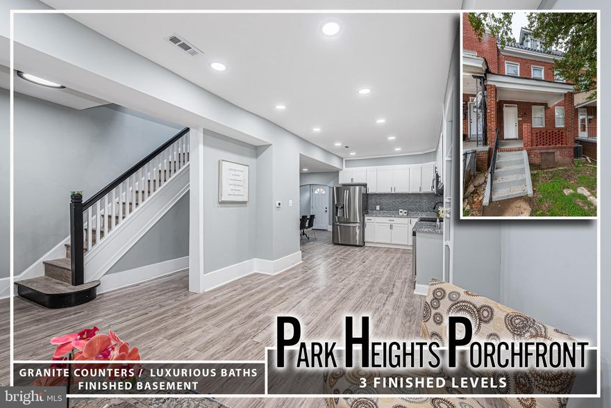 Beautifully designed porch-front rowhome offering three finished levels of stylish and functional living space, complete with rare two-car off-street parking! The open-concept main level features durable wood laminate flooring throughout, creating a warm and cohesive flow from the inviting living room into the spacious designer kitchen. Perfect for both everyday living and entertaining, the kitchen showcases stainless steel appliances, granite countertops, a sleek tile backsplash, and abundant cabinetry for optimal storage. A convenient main-level laundry room and half bath add to the home’s practicality.  Upstairs, retreat to the generously sized primary bedroom suite featuring a private full bath, along with two additional well-appointed bedrooms and a beautifully updated hall bath. The fully finished basement expands your living space with a large family room—ideal for movie nights, a play area, or a home office setup.  Enjoy outdoor living on the charming front porch overlooking the fenced front yard, perfect for relaxing or entertaining. This move-in-ready home offers the perfect blend of comfort, style, and convenience with the added bonus of private two-car parking—a true city luxury!