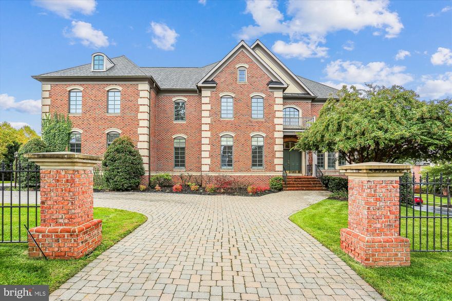 Welcome to a luxury enclave of homes in One of North Bethesda's most sought-after neighborhoods! Elegant finishes and modern comfort set the tone for this French-inspired, single-family home with 10' ceilings, to include 5 bedrooms/7 bathrooms. Enter into a gracious, wide central foyer with beautiful Brazilian Cherry hardwood flooring, opening onto both formal living and dining rooms and an office, then leading to the heart of the home -- the gourmet eat-in kitchen and window-filled family room. The kitchen showcases 42" French provincial cabinetry, granite countertops and stainless appliances, including a sleek cooktop nook and a built-in work desk. The island features bar seating, pendant and recessed lighting, and another tablespace close by. Walk through the glass doors onto a large Trex deck perfect for alfresco dining. On the upper level, a primary suite of almost 800 sf, is framed by a wall of windows and capped by a double tray ceiling and offers a huge walk-in closet. A handsome black and tan bathroom offers dual sinks, a separate water closet, spa tub and a new frameless glass shower door. Three other bedrooms, each with ensuite baths and a laundry room, complete the upstairs. The basement is another highlight of the home with a game room featuring a granite bar and sink; comfy seating area all to be outdone by the most adorable screening room ever! This floor also offers a 5th ensuite bedroom and a powder room. The low-maintenance exterior was professionally landscaped and there is a quiet Nature Pond as well as a tot lot just one block away, exclusive to the HOA