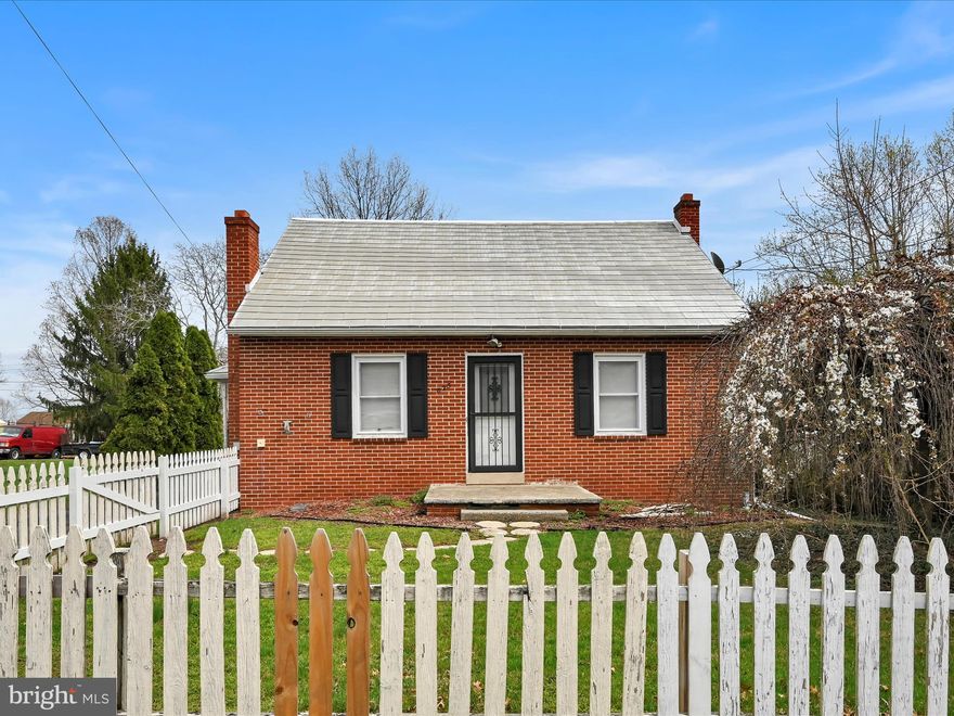 This solid brick Cape Cod is nestled on a level quarter-acre lot in Mount Joy Township! As you enter the home, you'll be charmed by the warmth of the corner fireplace and the timeless appeal of the stained wood trim. The updated kitchen offers ample cabinetry and counter space, conveniently located next to the dining area, making it perfect for everyday meals and entertaining. Adjacent to the kitchen is a spacious family room, featuring exposed brick walls, ceiling beams, and an additional fireplace adding even more character. With a main-floor bedroom and full bath, single-floor living is a breeze. Upstairs, you'll find two more comfortable bedrooms, providing flexibility for family or guests. The basement offers generous storage space or the opportunity for future expansion. Step out onto the rear patio, which overlooks the private, fenced-in backyard perfect for outdoor gatherings or serene relaxation.  A detached oversized two-car garage includes additional storage above, ideal for keeping everything organized. Schedule a private tour and you'll feel right at home!