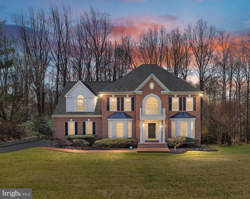 **OPEN HOUSE from 1 to 4 on SUNDAY, MARCH 23**  Simply GORGEOUS! Meticulously maintained and updated home with cul-de-sac street location -> .47 acre lot backing to acres of treed common area. Screen porch with Ceiling Fan, Skylights, Cedar Railings. Composite Deck with Pergola and Hot Tub. Side Load Garage. Finished Walk Out Lower Level. Custom designed upgrades with hardwoods through main and upper level plus high end finishes in Kitchen, Primary Suite, and all Bathrooms. Lower Level and Main Level built-ins and surround sound speakers extending to Deck. Gourmet Island Kitchen with under cabinet lighting, 48" cabinetry with pull out shelves, prep sink, beverage refrigerator, Viking Gas Range + Hood, GE Monogram 40" refrigerator, wall oven, microwave, warming drawer, and dishwasher. Butlers Pantry with beverage refrigerator flows to additional Dining Space. Family Room with fireplace. Main level Office, additional Living/Flex space, Two story Foyer. Serene Owners Suite to include Sitting Room and spa like marble accented Bathroom with chandelier above modern classic cast iron tub, seated shower, dual vanities with roll out shelving, and large walk-in closet.  Upper Level includes 2 more Bathrooms, 3 more Bedrooms, plus Bosch Washer/Dryer in Laundry Room. Walk out Lower Level with beverage refrigerator in Recreation Room, Fifth Bedroom with full size window, Fourth Full Bathroom, acoustical tile surround Music Room, Play Room, Storage Areas with shelving. High Ceilings, Detailed Mouldings, Ceiling Fans, Custom window treatments. Natural GAS for heating, hot water, cooking. 8 zone Irrigation System. NO HOA and non pass thru neighborhood. Lot backs to 5+ acres of common area that adjoins Fairfax County Parkland. Close proximity to Dulles airport, metro Silver Line, shopping of Reston, Oakton, and Tysons.