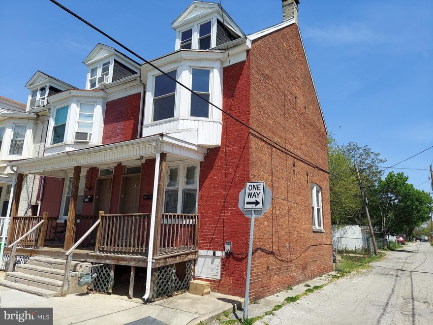 Investor special or great for first time buyers! This 4BR, 1 bath end unit row home is ready for its new owner. Features formal living and dining rooms, full kitchen with stove and refrigerator, plus washer and dryer in basement. Kitchen and bath remodeled 2013, gas furnace 2013, gas water heater 2024. Property was tenant occupied and needs some TLC. Rent was below market value. Cash or conventional financing only.