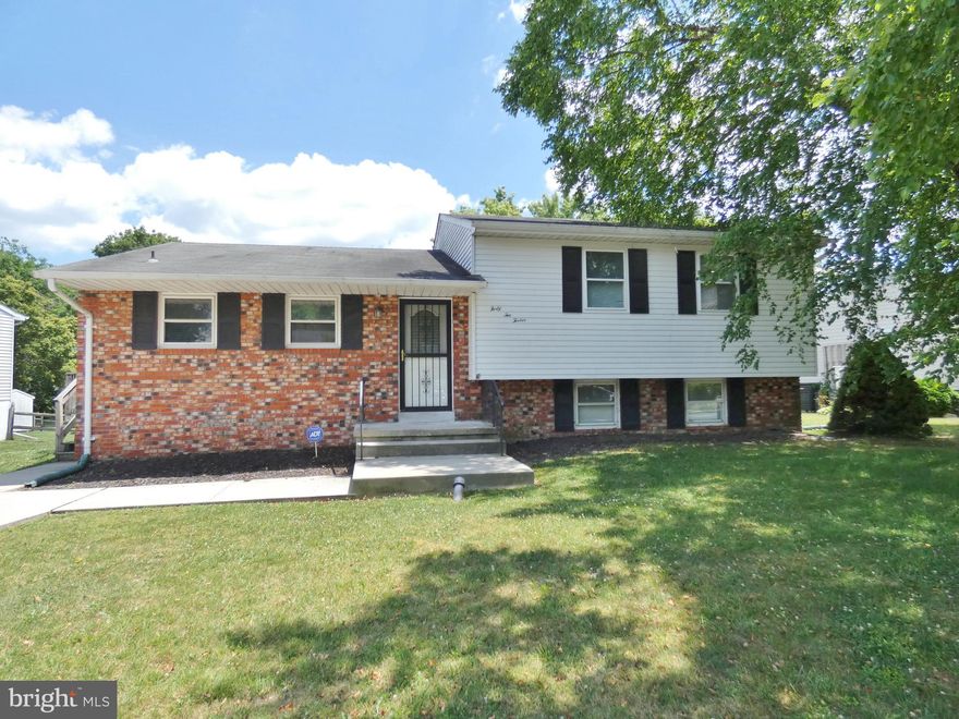 Spacious 4 Level Split! Main level offers spacious living and dining room with sliding glass door leading to the spacious deck, patio and AWESOME FENCED BACK YARD!  Kitchen has GAS COOKING and a convenient side door to the driveway.  The owners' suite offers 2 large closets with built ins and a full bath. Two additional generously sized bedrooms with HARDWOOD floors complete the upper level.  Down a few steps from the living room is a large family room with recessed lighting, powder room and a wood burning fireplace.  The laundry room is also on this level with washer and dryer, utility sink and door to the back yard. Down a few more stairs is another living area. GREAT FLEX SPACE! 19x19 finished space with carpet! Perfect media room or playroom !  Well cared for home in a CONVENIENT LOCATION  and plenty of OUTDOOR LIVING SPACE! Pets considered on a case by case basis.  Click the link under Lease Information to apply. All tenants 18 and over need to apply.