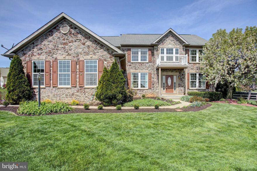 Stunning Former Builder Model in Shadow Creek – Loaded with Upgrades! Welcome to this exceptional Colonial-style home in the desirable Shadow Creek neighborhood, boasting nearly 5,000 sq. ft. of finished living space across three levels. As a former builder model, this residence showcases premium finishes and thoughtful design throughout. The main level features a formal living room, dining room, and a private den/office, perfect for remote work or quiet reading. The sunken family room is a showstopper with a floor-to-ceiling stone gas fireplace and brand-new LVP flooring. The gourmet kitchen is a chef’s dream, offering granite countertops, maple cabinetry, a center island with a new electric cooktop, double wall ovens, built-in microwave, and a spacious morning room thanks to the three-level bump-out. Enjoy hardwood floors throughout most of the main level, a dual staircase, and a wet bar for entertaining. Additional conveniences include a main-level laundry room, a mudroom off the garage, and a heated/cooled garage with extra storage. Upstairs, you'll find four generously sized bedrooms. Two share a Jack-and-Jill bath, one has its own en-suite, and the primary suite is a luxurious retreat with a sitting area, gas fireplace, and a spa-like bath featuring a soaking tub, stall shower, water closet, and a massive walk-in closet with a laundry chute. The finished basement offers flexible living space with a large rec room (ideal for guests), a media room wired for surround sound, a full bath, and a spacious utility/storage room. Walk-out access via a wide areaway adds convenience and natural light. Step outside to a large rear composite deck, perfect for entertaining or relaxing in your private backyard oasis.