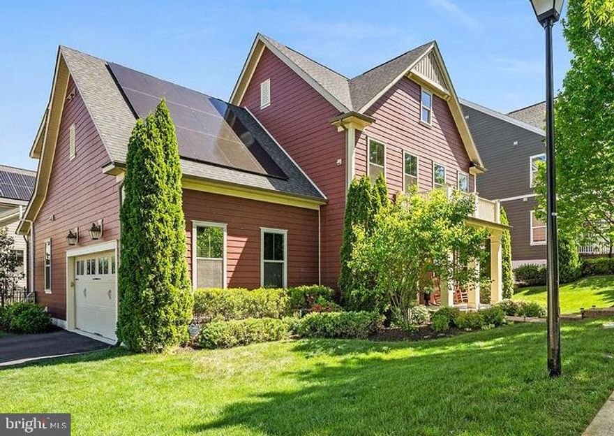 Luxury Living in Potomac Shores 

Welcome to this exceptional Cape Charles model by NV Homes, located in the highly sought-after, resort-style community of Potomac Shores. Showcasing refined design and significant upgrades, this property seamlessly blends everyday comfort with sophisticated entertaining and modern energy options. RARE MAIN-LEVEL BEDROOM SUITE: Unlike standard floor plans, this home features a highly coveted main-level bedroom complete with a full en-suite bathroom, offering a private, accessible layout without the need to navigate stairs. GOURMET CULINARY DESIGN & OPEN LIVING: The open-concept main level showcases rich hardwood flooring, soaring 10-foot coffered ceilings, and a refined study with built-in bookcases. The chef's kitchen is a standout, featuring a massive center island with seating, a custom walk-in pantry, granite countertops, and a premium GE Profile dual-fuel setup: a 5-burner gas cooktop paired with an induction oven, plus a separate wall oven and microwave combo. The kitchen flows effortlessly into a spacious great room anchored by a gas fireplace. THE ULTIMATE ENTERTAINMENT HUB & EXPANSION POTENTIAL: The lower level features a sprawling recreation room, a dedicated play area, and an impressive custom granite bar fully equipped with a beverage refrigerator, a secondary dishwasher, and abundant cabinetry. Beyond the finished entertainment zone, there is a full bathroom and 607 square feet of unfinished space offering incredible expansion potential. With the home's mechanical systems tucked neatly out of the way, the expansive utility and storage rooms provide a perfect blank canvas to instantly build equity by creating a home gym, media room, flexible living space, or otherwise incorporating more space into the main recreation area. OUTDOOR LIVING & A MASSIVE SOLAR ADVANTAGE: Step outside to a premium, low-maintenance Trex deck overlooking a fully fenced backyard—perfect for pets, play, and outdoor dining. The property comes equipped with a fully owned, premium 12.4 kW solar panel system (activated in June 2023) providing substantial financial benefits. LUXURIOUS UPPER-LEVEL RETREAT: Upstairs, you will find four spacious bedrooms, including a luxurious primary suite featuring architectural tray ceilings, an enormous walk-in closet, and a spa-like en-suite bath with a soaking tub, separate glass-enclosed shower, and dual vanities. Two secondary bedrooms share a convenient Jack-and-Jill bath, while the fourth bedroom enjoys its own private en-suite. UNMATCHED RESORT-STYLE COMMUNITY: Enjoy world-class amenities including the Jack Nicklaus Signature golf course, three pools, a state-of-the-art fitness center, a kayak launch, and miles of scenic trails. Future-proof your investment with the highly anticipated VRE commuter station currently under construction, an expanding waterfront Town Center, and a planned elementary school opening in 2027. Ideally located near Interstate 95, Marine Corps Base Quantico, Fort Belvoir, and Washington, D.C., this home offers the perfect blend of luxury, convenience, and strategic financial positioning.