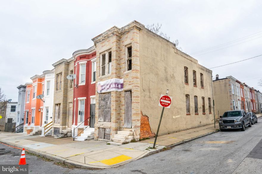LARGE END OF GROUP ROWHOME THAT'S READY FOR YOUR RENOVATIONS!  Located directly across from Bon Secours Smallwood Summit and a block from Grace Medical Center.  Sold As-Is!