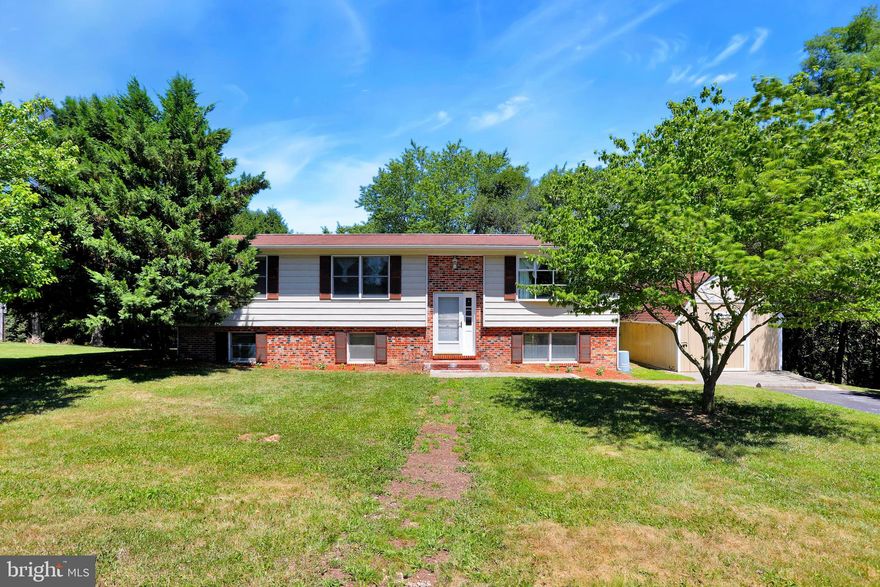 Finally renovations complete!! Nice split foyer in a well established neighborhood, built with a brick and vinyl exterior. Close to the VA, IRS and Coast Guard.  Great commuting location because  you are minutes to Sheetz and Rt 9 and 340, but on a quiet street well off the highway.  This lot backs to a  privately owned pond and that area will remain open. The back yard is fenced!  Freshly painted inside,  new flooring in upstairs, new carpeting,  updated bathrooms. Open kitchen, dining and living room combination perfect for entertaining. Wonderful deck off of the dining area with steps down to enjoy the private back yard.  Master on  first floor with en-suite bath,  two other bedrooms share the hallway bath.   Full bath and bedroom on lower level - could also be used as a Master bedroom. Large family room in the lower level.  Built in shelving,  washer/dryer and extra storage area.  Shed for extra storage and equipment, but could easily be made into a garage.