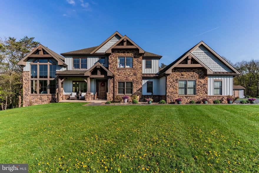 Stunning, rustic contemporary home with a perfect blend of character, security, and modern efficiency, set against picturesque mountain views in the heart of the Fishing Creek Valley. This beautifully updated, move-in ready Roland-built home offers a warm yet refined retreat designed for both everyday living and exceptional entertaining.  Conveniently located to Harrisburg, Hershey, HBG Country Club, Major Transportation and Shopping.

At the center of the home is a showpiece kitchen featuring a brand new Michelangelo quartzite island, freshly painted cabinetry, new backsplash, new icemaker, and newer appliances. Large windows surround the space, including a farmhouse sink overlooking the backyard, filling the home with natural light and framing scenic views. Expansive cathedral ceilings enhance the open feel while capturing the beauty of the surrounding blue mountains. 

Recent improvements include full interior and exterior repainting, all new designer light fixtures and chandeliers, new tile flooring in the office, and new carpet in the primary suite and four additional upstairs bedrooms. The main level also features a new guest bathroom vanity and fresh paint, creating a clean, updated feel throughout. Additional highlights include hardwood flooring, a desirable open floor plan, a functional mudroom, and push-button blackout shades in the primary bedroom and bath, along with blackout shades in all upstairs bedrooms.

Designed as a true smart home, the property offers seamless control of multi-room audio, smart lighting, security, and cameras from a single easy-to-use interface accessible from any device. Enjoy premium speaker systems on the main and lower levels, 24/7 security with on-site recording and professional monitoring, and smart lighting with automatic and security-triggered activation.

The fully finished lower level is an entertainer’s dream, featuring a spacious retreat, a new full bathroom with coffered/copper ceiling, a custom walk in gun safe room, and a hidden Murphy door leading to a newly built storage area. A thoughtfully designed bar area with sink and brand new mini refrigerator creates the perfect setup for hosting guests or enjoying a private lounge space.

Set on 25 private acres, this property offers unmatched seclusion, natural beauty, and abundant wildlife, including deer, turkey, and bear, making it a rare opportunity for outdoor enthusiasts. A creek winds through the property, enhancing the peaceful setting. Outdoor improvements include a freshly painted storage barn, newly painted bridge, a new driveway lined with Royal Burgundy cherry trees, and beautifully rocked front yard landscaping.

Additional highlights include a 3-car garage with new Fox-coated flooring, an upstairs deck, and a covered lower-level patio.

This home delivers a rare blend of lodge-inspired character and modern sophistication, all in a setting that feels like your own private mountain retreat.  This home is for the most discerning buyers.