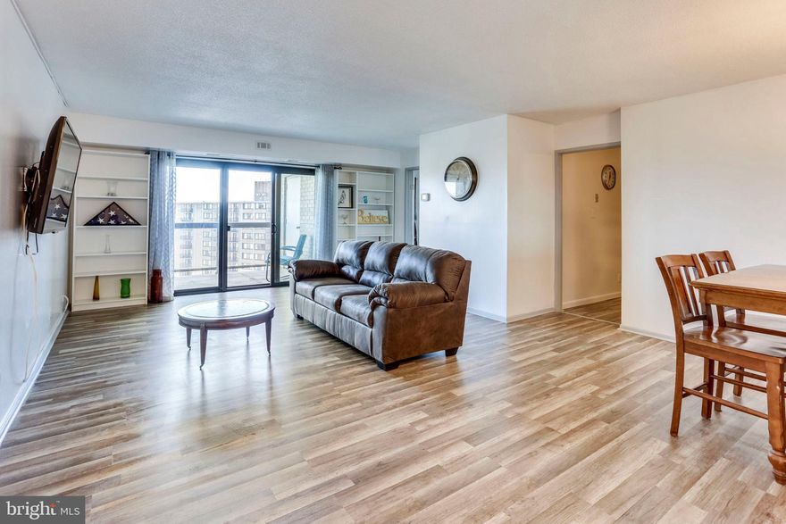 OFFER DEADLINE - 7PM SAT, 4/6. Beautifully updated, bright & spacious condo w/ amazing views from the 16th floor! Kitchen updated w/ stainless steel appliances, upgraded counters & backsplash; remodeled bathrooms w/ gorgeous tile surrounds, updated vanities, sinks & fixtures. Enjoy breathtaking views of the pool & tennis courts  (even a glimpse of the Washington Monument!) from the spacious balcony! Dual master bedrooms w/ walk-in closets.  Gorgeous on-trend wood-like flooring throughout, fresh paint, TONS of storage/closets! Unbeatable resort-style amenities including indoor & outdoor pools, tennis courts, fitness center, racquetball, basketball, tot lot, security & much more! Pet friendly. Includes all standard utilities (except internet/cable/phone)!