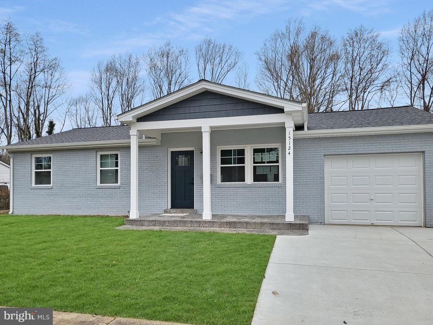 Completely rebuilt home with new floor plan. It features new hardwood floors, new carpet, new windows, new roof,  new quartz countertops, new cabinets, new stainless steel appliances. freshly painted. It has a 2 car driveway with a garage and plenty of street parking. Close to schools, shopping , and restaurants.