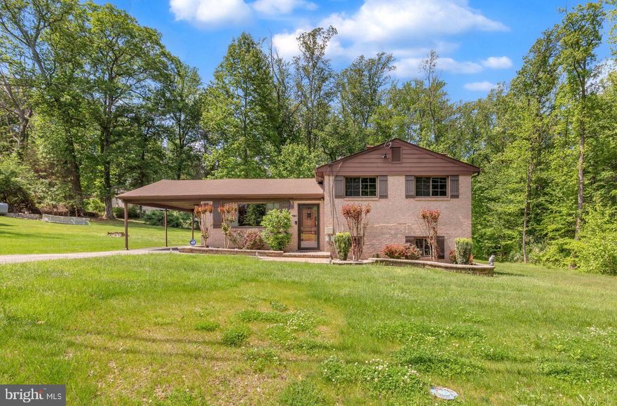 This beautifully renovated 4-bedroom, 2-bath split-level home is sure to impress. The upper level offers three spacious, carpeted bedrooms and a full bath, while the main level features an open-concept living room and updated kitchen—perfect for modern living. The lower level includes a versatile fourth bedroom that can also serve as a second living area, along with a full bath, laundry, and extra storage. Every detail has been thoughtfully designed, from the meticulously manicured landscaping to the spacious detached garage and additional carport. Nestled on a tranquil 0.48-acre lot with adjoining green space, this home offers a peaceful setting ideal for enjoying quiet summer evenings. Conveniently located near Joint Base Andrews and Joint Base Anacostia-Bolling, with an easy commute to Washington, D.C., and Northern Virginia, this property offers the perfect blend of comfort and accessibility. Don’t miss the opportunity to fall in love with this special property!