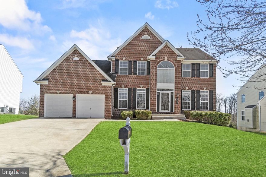 Step into a world of serene elegance and heartfelt comfort in this 5-bedroom, 3.5-bath colonial gem, nestled within the tight-knit community of Rose Valley Subdivision in Fort Washington, MD. Perched on a gracious 1/3-acre lot, this brick-front marvel is a testament to spacious living woven with intimate charm, creating an idyllic setting for both daily life and grand entertaining.

Upon entry, the grand two-story foyer, bathed in natural light, unfolds into a thoughtfully designed floor plan. To the left, a serene office space, adorned with chic French doors, offers a peaceful retreat for work or study. To the right, the formal living and dining areas stand ready to host cherished moments with loved ones.

In 2022, this home underwent significant upgrades, including a full kitchen remodel that introduced top-of-the-line appliances, exquisite countertops, and a stylish backsplash, elevating the culinary experience to new heights. The entire house was also completely repainted, bringing a fresh, modern feel to every room. The adjoining sunroom, drenched in sunlight, provides a peaceful nook for tranquil mornings or leisurely afternoons. Meanwhile, the family room, centered around a cozy fireplace, invites relaxation and togetherness.

Ascending to the upper level, the expansive owner's suite, featuring a sitting area, custom closets, and a luxurious soaking tub, promises a secluded escape for rest and rejuvenation, alongside three additional well-appointed bedrooms.

Descending to the basement, a spacious recreation room, a bedroom, full bathroom plus two bonus rooms — one fashioned as a bespoke closet and the other a flexible workout space, alongside a custom-designed bar, perfectly marries utility with entertainment, highlighting the home's dedication to comfort and delight.

Outside, the residence boasts a two-car garage and an extended driveway for ample parking, complemented by inviting deck and patio areas, all set against the backdrop of the property's charming landscape. With the 2022 upgrades, including all-new light fixtures and a comprehensive repaint, every detail of this home radiates modern sophistication and welcoming warmth, inviting you to embark on a new chapter in Fort Washington.