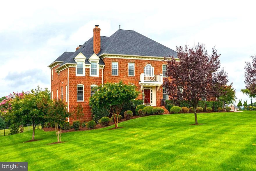 MAGNIFICENT Georgian gracing beautiful 2.2-acre lot in coveted enclave. Built by GP Homes in 2004, this property is meticulous. Golden oak floors diffuse the bounty of natural light flowing through oversized windows. From the grand 2-story foyer and octagonal rotunda to graceful archways and impressive ceiling geometry, beautiful appointments abound. Main level highlights include formal living and dining rooms, a gorgeous designer kitchen with butler's pantry open to a phenomenal Great Room, a private office, and an elegant powder room. The upper level boasts a luxurious owner's suite with breathtaking views, 3 spacious sun-filled bedrooms, 2 additional baths, and a laundry room. The walk-out lower level offers a sizable family room with kitchenette, a home theater, a billiards room, a spacious guest room with en suite bath, the 5th full bathroom, and a large carpeted bonus room (currently used for storage). French doors on multiple levels offer passage to the rear grounds and deck where the stunning panorama can be fully enjoyed. Vast green recreational space, professional landscaping, and a side loading 3-car garage complete the exterior package. Equestrian facilities, parkland & trails, and shopping/dining are but a few of the area's notable amenities.