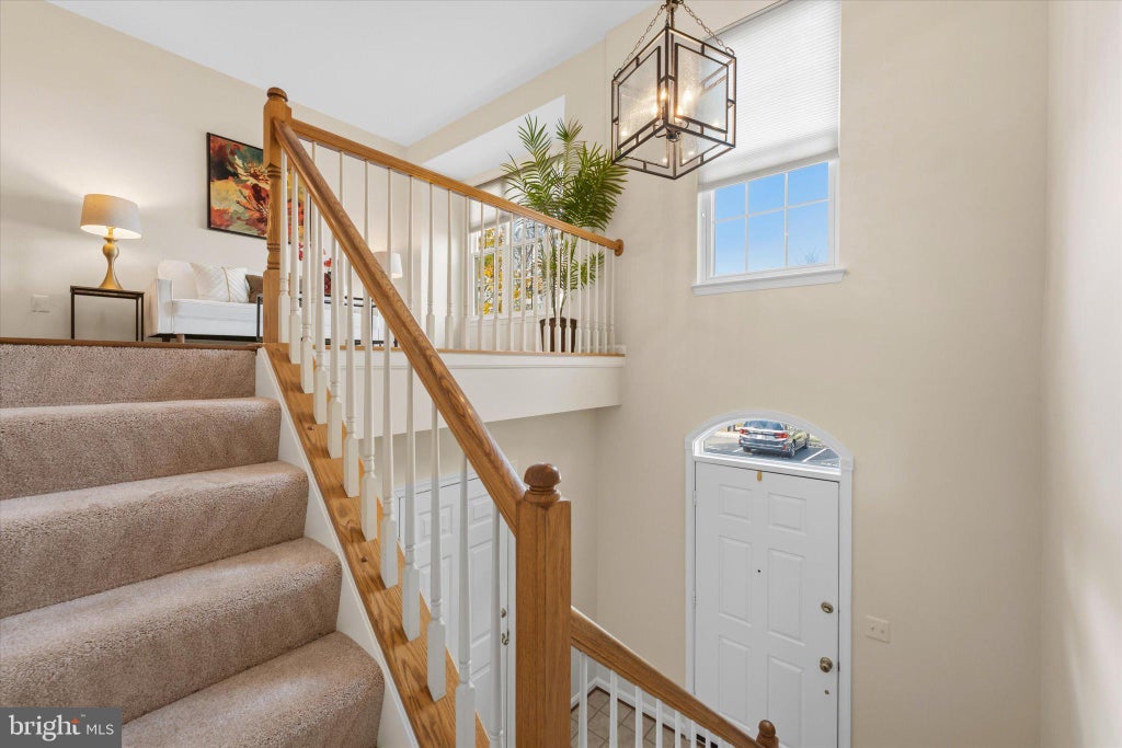 Photo of 21777 Kings Crossing Terrace, ASHBURN, VA 20147 (MLS # VALO2139116)