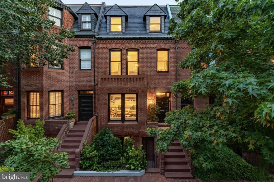 Prominently positioned on a tree-lined street between Dupont and Logan Circle, 1620 Riggs Place NW captures the timeless appeal of classic New York City brownstones, thoughtfully reimagined for modern living. Rich in character yet meticulously updated, the home offers approximately 3,100 square feet of refined living space where historic details and contemporary sophistication coexist effortlessly.

Original architectural elements, curated finishes, and gold-accented hardware establish an immediate sense of understated elegance. Soaring ceilings and abundant southern light enhance the home’s gracious scale, while recent renovations elevate both form and function throughout. The kitchen, comprehensively redesigned in 2023, serves as a sculptural centerpiece, finished in striking marble and outfitted with top-tier appliances that cater to both daily living and elevated entertaining.

Private outdoor spaces further distinguish the property, including a beautifully finished rear terrace and patio designed for seamless indoor-outdoor living. The residence is complemented by advanced systems and amenities, including updated HVAC, security and video surveillance, Lutron lighting, Sonos audio, gated parking, and an additional parking pad. 

Layered in amenities, rich in charm, and located in one of Washington’s most central and sought-after neighborhoods, 1620 Riggs Place NW presents a rare opportunity to own a home that seamlessly blends timeless architecture with modern luxury.
