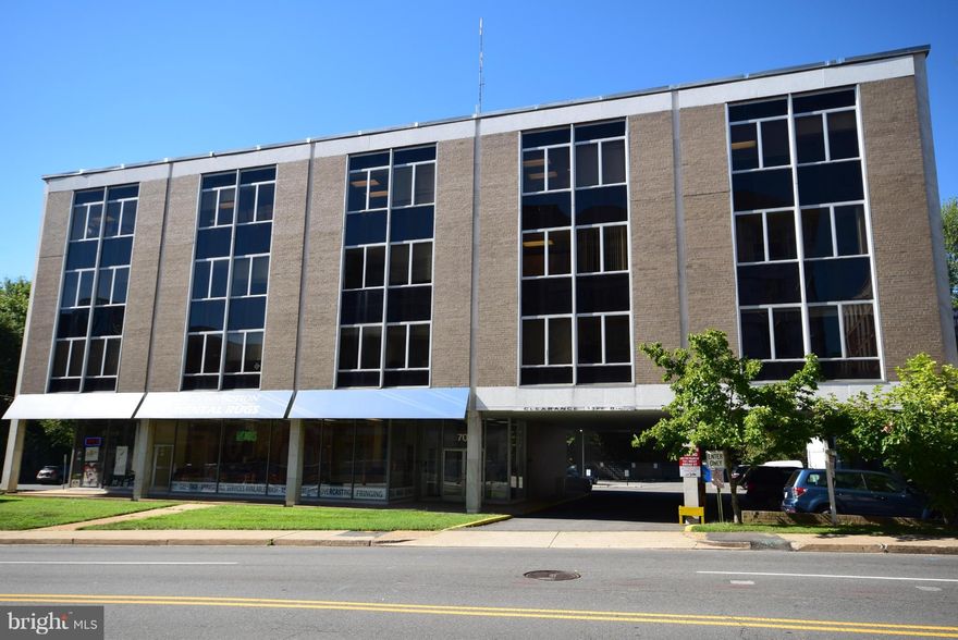 578 Square Foot suite #301,  Also available is Suite 210, which is approx. 325 SF, renting for $600 per month. Commercial Office building: Large windows/bright, good exposure to W Broad St, full service-- rent includes all utilities, janitorial services, maintenance, operating expenses and taxes. Owner-managed, easy access to I-66/495.   Bus stop nearby. Friendly building with many long term tenants. Tenant may choose carpet.  Two reserved parking places.