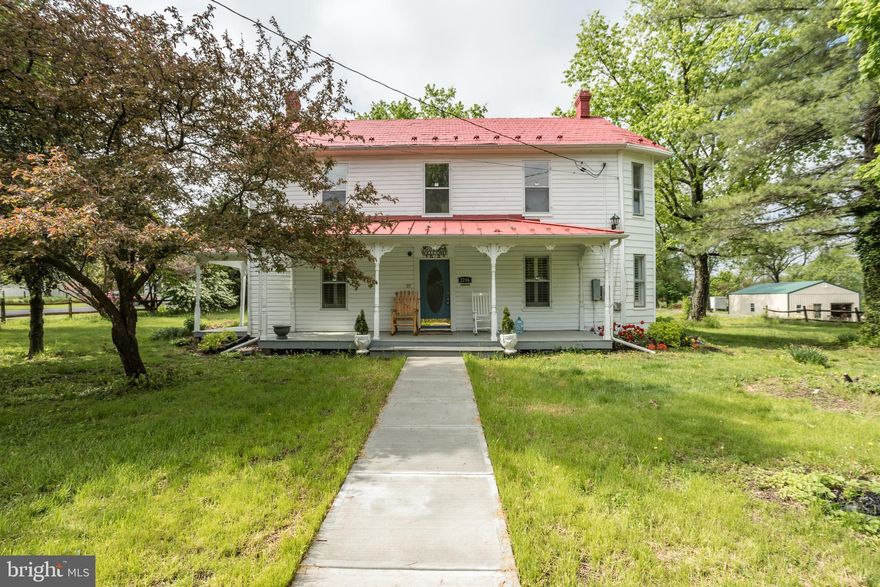 A storybook farmhouse that boasts character, age and beauty from a post civil war era w/ central air! 
 Nestled in the quaint village atmosphere of Brucetown. On 1.17 peaceful acres with pastoral views, this home is complete w/ outbuildings, mature trees -including a gorgeous magnolia tree, inviting front, rear & side porches. Home is filled w/ light, large rooms, high ceilings & metal roof to hear the raindrops. Beautiful hardwood floors throughout.   1728 square feet of living space.  2 open gas fireplaces with hand made brick. Fairly rectangle lot, detached garage with bays on either side and workshop in the middle (under construction). There is a newer central air system installed by H.N. Funkhouser - brand new system inside and out. There is one bathroom on the main level. Upstairs offers 2-3 bedrooms. The 3rd bedroom has over sized closets with entry from the back stairs. Upstairs also has a 3 season sun room with new electrical.  This property has so much to offer.....make it into your dream.  Stellar potential as an airbnb investment property. 
  Cellar is accessed through rear side porch trap door in floor. Water heater is a couple years old. 500 Gal. Propane tank purchased from Southern State installed below ground. Installed 3/4" line to kitchen for future gas appliances. Gas fireplaces are 33,000 BTU's purchased from The Gas Store. Pipe in side yard is discharge for sump-pump. Standing seam roof on porch installed new a few years ago.  Heat pump installed in 2016.  
Sweet summer time porch sitting at its finest.  Welcome Home!

This house is currently an airbnb and rents for $111/night!

CHECK OUT THE LOCATION - 
AREA HIGHLIGHTS: Summit Point Motorsports Park (5 miles), Old Town Winchester (10 miles), Shenandoah Valley Discovery Museum (10 miles), Apple Blossom Mall (11 miles), Museum of the Shenandoah Valley (12 miles), Charles Town Farmer’s Market (13 miles), Hollywood Casino at Charles Town Races (14 miles), Dinosaur Land (18 miles)
EXPLORE NATURE: Jim Barnett Park (10 miles), Shawnee Springs Preserve (11 miles), Shenandoah River (17 miles), State Arboretum of Virginia (20 miles), Appalachian Trail Conservancy (21 miles), Sky Meadows State Park (28 miles), Shenandoah National Park - Front Royal Entrance (35 miles)
LOCAL VINEYARDS: Briede Family Vineyards (8 miles), James Charles Winery & Vineyard (16 miles), Veramar Vineyard (17 miles), Twin Oaks Tavern Winery (20 miles), Valerie Hill Vineyard & Winery (20 miles)
AIRPORTS: Hagerstown Regional Airport (42 miles), Dulles International Airport (51 miles)