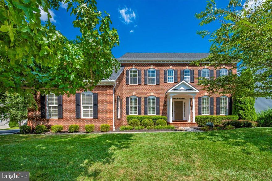 Incredible, impeccable, and spacious home on a large corner lot in Glenbrook offers four finished levels of living space!  This gem offers a 3-car side-load garage, a huge entry foyer, main level office with built-ins, and a formal living and formal dining room. The enormous gourmet kitchen features beautiful cabinets and granite counters, upscale and large gas 5-burner cooktop plus double wall oven, stainless appliances including the refrigerator and dishwasher, built-in microwave, pantry, and a huge island with plenty of seating.  There is also a gracious sized table area with door leading to the deck.  A huge family room is off the kitchen and allows for a lot of natural light through the many windows and features a beautiful gas fireplace.  The laundry room is just off the kitchen and leads to the garage.  
The second level features a primary suite entered by a double door.  There is a spacious sitting room to the left and huge bedroom area for placement of even the largest king-sized bed and other furniture.  The primary bath has an inviting soaking tub, large separate shower, double vanity, and separate water closet room.  Additionally, the primary suite boasts a huge walk-in closet featuring a light that comes on with motion!  A second and third bedroom share a Jacki-n-Jill buddy bath and both have ceiling fans, windows treatments, and roomy closets.  The fourth bedroom on the second level has its own private tub/shower bathroom.   A beautiful stairway leads to a finished third level that features a bonus room, a full bath, and a fifth bedroom.  This level is a perfect retreat for guests or if you just want a space to get away.   The spaciousness of this home continues into the level walk-out basement level.  A huge, finished recreation room awaits and features a wall of mirrors for the dance enthusiast or those who enjoy the extra brightness mirrors offer, a large storage room with built-in shelving, a utility room, and an additional storage/craft room area that includes an oversized stainless sink that is perfect for washing the dog or maybe even making some wine!  The door from this area leads to a beautiful paver patio area complete with a fire pit and inviting hot tub.  The back yard is landscaped beautifully and is partially fenced.  There is also a stairway that leads to the Aztec deck which is off the kitchen.  
This home is so spotless and has been so well maintained that it shows like a new home.  The  HVAC system was replaced in 2018 and due to hail damage, the roof and gutters were just replaced in August 2025.  There are plantation shutters on the 1st floor and wooden blinds throughout.  The whole house water softener was replaced in 2025.  
Of note to those with school aged children -- since the sellers have lived here, school bus service has been provided for the children.  Not all of the neighborhood has this benefit.  Check with Frederick County Public Schools for more information or to see if any change might be in the works.
Don't delay, call to see this beautiful home today!  It is rare to find a home with the finished third level in such beautiful condition on such a beautiful lot.  The current tax bill reflects the sellers receiving the homestead tax credit.
Information is believed to be accurate but should not be relied upon without verification.  Accuracy of lot size and other information is not guaranteed.  *** EQUAL HOUSING OPPORTUNITY