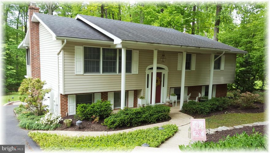 Sited perfectly on a .78ac lot backing to a natural wooded setting is this lovely home w/an updated kit. & master bath, a year-round sunroom addition for relaxation, a spectacular walk-out family rm. w/a F/P & French doors to your garden patio surrounded by natural stone landscapes, hardwood on the main & endless structural & mechanical updates. Affordable tranquility feeding to Perry Hall schools