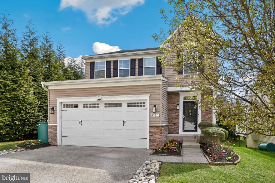 Absolutely exquisite, this fully renovated and upgraded stone-front Colonial in Ellicott City boasts over $200K in ugprades. Nestled conveniently close to all amenities, this sunlit abode features 5 bedrooms, 3.5 baths, a fully finished walkout lower level, main level office, flagstone patio, and much more.

Step through the elegant foyer into a space adorned with gleaming wide-plank hardwood floors, enhanced by chair rail, crown molding, and recessed lighting throughout. The main level offers a main-level office with dual French doors, a renovated powder room, separate dining room, and a spacious family room. The expanded gourmet kitchen is a chef's dream with 42" maple cabinets, stainless appliances including a French door refrigerator and 5-burner gas range, quartz countertops, gleaming white subway tile and a large pantry. A breakfast bar opens to the breakfast room and leads to the sunroom, adorned by a wall of windows.

Ascending to the upper level reveals the owner's suite, featuring crown molding, custom paint, a spacious sitting room, and a fully upgraded luxury owner's bath complete with a free-standing whirlpool/jetted tub, dual vanity with quartz countertops, separate shower, and his and hers walk-in closets. Three additional generously-sized bedrooms, a renovated full hall bath, and an upper-level laundry room complete this floor.

The walk-out, fully finished lower level is an entertainer's delight, offering a large rec room with a conveying home theater system, a bar/kitchenette with an island and refrigerator, an exercise room/office/den, a legal bedroom with egress, an upgraded lower level full bath, and ample storage space. Outside, the flagstone patio with pergola and swing, along with custom stone work, creates an inviting outdoor retreat.

This home features a brand new roof in 2023, fully renovated bathrooms in 2022, and over $200K in other recent upgrades. Situated just minutes away from shopping, grocery, restaurants, and major transportation routes including Rt 100, I-95, and Rt 29, this home is luxurious living at its finest. Don't miss the chance to experience it firsthand at the open house on Sunday, 4/14, from 1-4PM. Seller prefers rent back through June 30, 2024. Offers due Monday 4/15 at 6PM.
