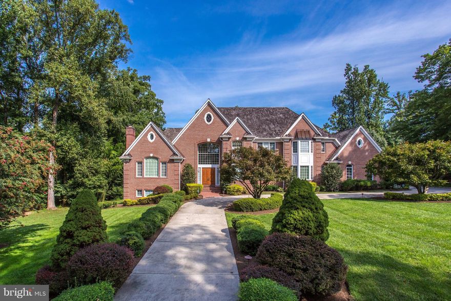 Sensational custom built home on level, prof. landscaped grounds.Sun-drenched elegant Entry Hall leading to beautifully appointed rooms. Large Kitchen opens up to FamRoom,Library w/built-ins, Bedroom-Suite main level,Large Master Suite 2nd floor.All bedrooms w/en-suite baths,high ceilings, mill work,high quality finishes,fabulous lower level walk-out.Entertain in Style and enjoy casual gatherings!