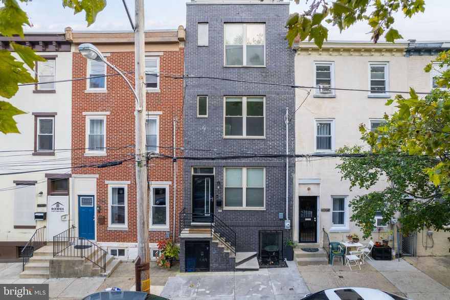 BEST VALUE in 19130 with 5 YEARS LEFT ON THE TAX ABATEMENT!  5 Years remaining on the Tax Abatement! This well-appointed 16-foot wide, 3-story home is nestled in one of the best pockets of the neighborhood where everything in this home is bigger, wider, taller, and brighter than other homes in this price range! It features 3 bedrooms, and 3 full bathrooms, with an oversized primary bedroom, ensuite 4-piece bath, large windows, finished basement, rear patio, and full roof deck! Other features include extra wide hardwood plank floors, recessed lighting, a private patio, a convenient 2nd floor laundry room, central air, and transitional finishes and fixtures throughout the entire home. Enter the FIRST FLOOR to this beautiful home with an open concept living/dining room leading to a large eat-in kitchen and patio, flooded with natural light. The Kitchen features stainless steel appliances with a vent hood (GE brand), gray 42” inch shaker style cabinets, white quartz counters, and large island with counter seating and additional storage. The L-shaped kitchen layout embraces the outdoor patio with large windows. The outdoor patio offers convenient access to outdoor space for lounging and grilling with added privacy from an adjacent open space. Proceeding to the SECOND FLOOR there are 2 generously sized bedrooms with ample closet space with a full bath a large vanity with marble counters, floor-to-ceiling tiles in the shower, and a laundry room with a stackable front-loading LG washer & dryer in between the bedrooms. The THIRD FLOOR is entirely dedicated to the homeowner, with a large bedroom with 9-foot ceilings that can accommodate a king-size bed and other large furniture. As you move to the rear of the floor there are TWO WALK-IN CLOSETS and an oversized Master Bath adorned with porcelain marble tiles, a walk-in shower with rain head, a double vanity with quartz counters, and a dual flush toilet. The large rooftop terrace is expansive with room for an outdoor living room with unobstructed views of the skyline. The BASEMENT is fully finished with a full bath and room for storage! Walk Score of 90, Transit Score of 79 & Bike Score of 83!! Quickly becoming the heart of the neighborhood. Close to the Philadelphia Museum of the Art and Eastern State Penitentiary, with plenty of shopping & entertainment options. Walkable to Lemon Hill, Fairmount Park, and Boathouse Row. Easily accessible via I-76, Kelly Drive, Route 13, and public transportation bus routes to get around the city. Local favorite spots include Brown Street Coffee, Hilltown Tavern, Figs, The Monkey & The Elephant, Zorba’s Tavern, and plenty more! Excellent value in an emerging area! 5 Years left on the Tax Abatement! Lease ends May 4th.