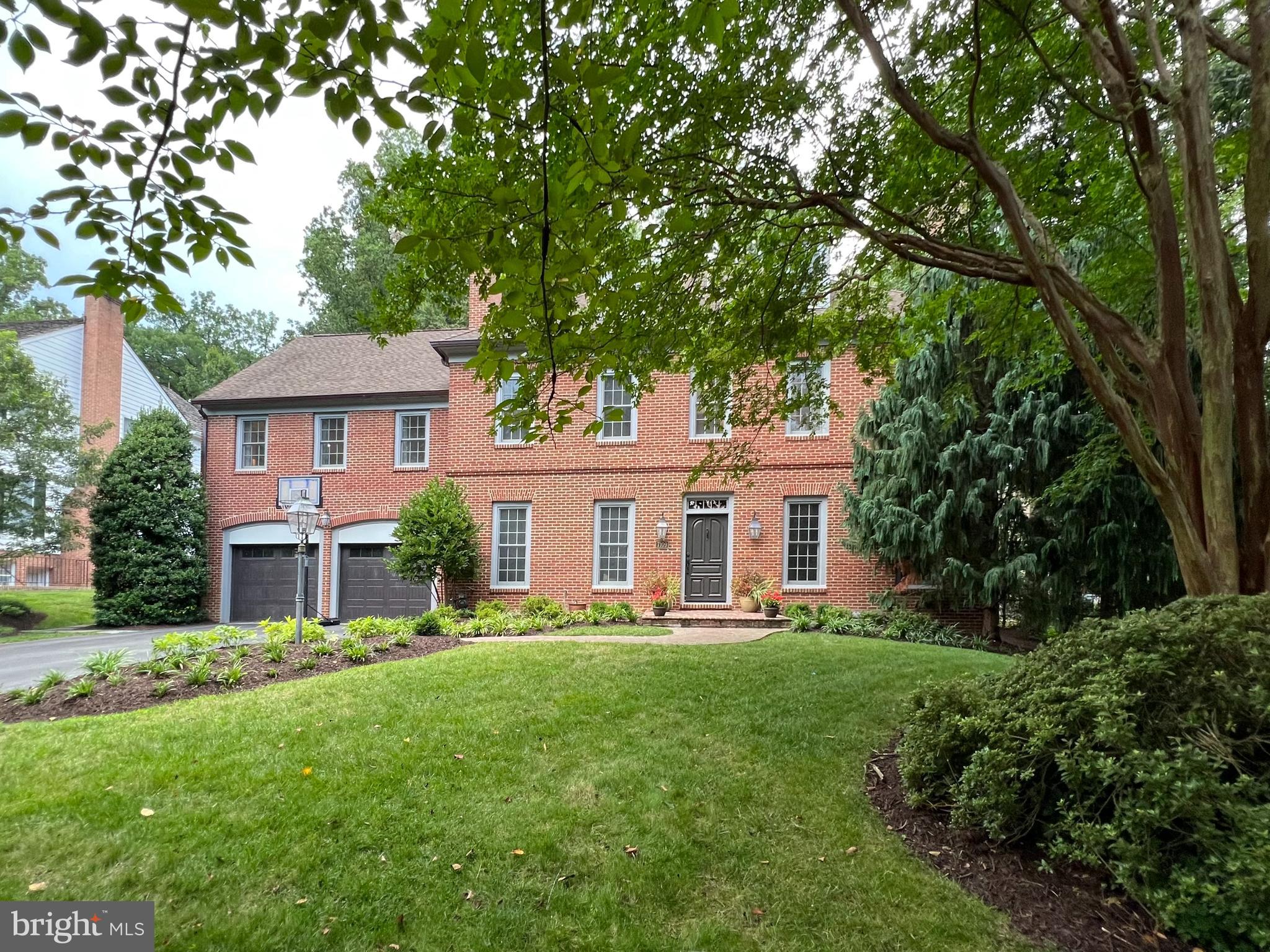 7109 Heathwood Ct is a stunning 6,000+ square foot home sited on almost a half an acre lot and nestled in the serene neighborhood of Bradley Hills in Bethesda, Maryland. This recently renovated colonial-style residence has so much to offer, containing 6 bedrooms, 4.5 bathrooms and an elegant design with classic charm throughout.
The main floor features a welcoming foyer, a stylishly appointed living room with wood burning fireplace, a formal dining room for hosting gatherings, and a large family room with floor to ceiling windows overlooking the lush backyard, providing the ideal ambiance for relaxation. The heart of the home is a gourmet eat-in kitchen, equipped with high-end appliances, sleek countertops, and ample storage space. The breakfast nook is perfect for enjoying morning coffee while overlooking the scenic surroundings. The kitchen, screen porch/deck and basement renovations were completed by BOWA builders and seamlessly blends luxurious modern elements while maintaining a timeless design. This space offers the best of indoor-outdoor living with a wall of glass accordion door fully opening to deck, screened porch and outdoor spa. An office with custom built-ins overlooks the expansive backyard.
As you ascend the staircase, you'll find the luxurious master suite, offering a private sanctuary with a spa-like en-suite bathroom, walk-in closet, and a private sitting area and fireplace. Four additional well-appointed bedrooms provide ample space for family members or guests, and two newly renovated bathrooms ensure convenience and comfort. The third floor has been fully finished and can serve as a sixth bedroom, game room or amazing flex space.
The finished basement is flexible and can accommodate many uses. Currently utilized as a family room with adjacent game room and separate home gym, this space also includes a renovated full bath and could easily be an AuPair Suite.
One of the home's most delightful features is its connection to nature. The property sits in a quiet cul de sac. Lovely screened porch connecting to a spacious deck is the perfect place for entertaining. Don’t miss the in-porch spa!
With two-car garage parking and a generously sized driveway there is plenty of space for your friends and family when they visit. Nature lovers will appreciate the proximity to parks, providing opportunities for leisurely strolls and other recreational activities. For golf enthusiasts, both the Burning Tree Golf Club and the Bethesda Country Club are just a stone's throw away. Burning Tree Elementary and Thomas Pyle Middle are both situated in the same neighborhood and Walt Whitman High School is within a mile and a half from the home, making school commutes a breeze. Enjoy the luxury and convenience of this gorgeous home, offering the best that Bethesda has to offer.