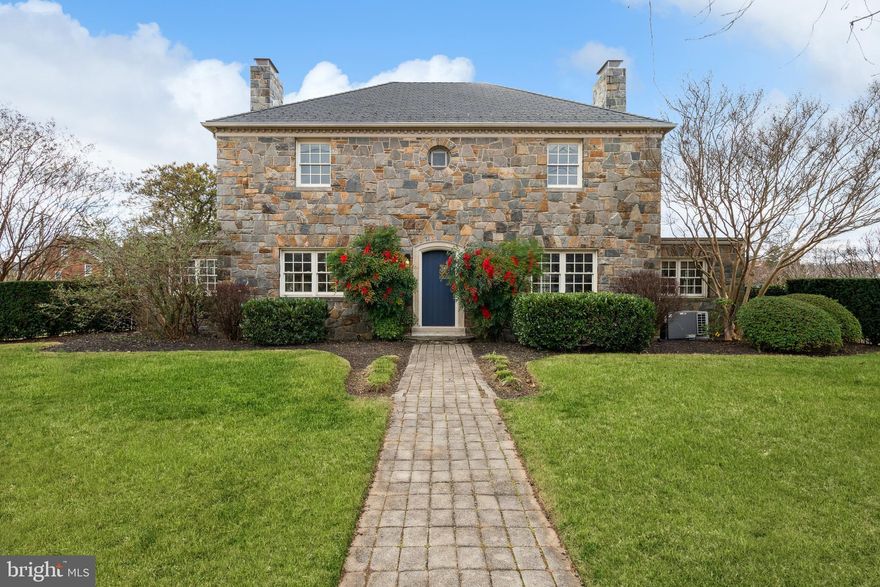 Down Rosemont, is the most exceptional opportunity to purchase a home long coveted and talked about in Baker Park. It is now available for the first time in almost thirty years. As you approach, you immediately notice the shear size of this private double lot and the quality of the stone construction. This Dutch Colonial is flanked by two chimneys, boasts a slate roof and has the most compelling appeal. Enter from the Magnolia side to a private, gated, brick driveway. As you enter, you are struck by the incredible covered rear patio. It is the perfect place to entertain, gather and create memories. The rear yard is one of the best elements of the home with wrought-iron fencing throughout and mature hedges for privacy. Enjoy evening sunsets from your private backyard retreat. Enter to an interior space that has been transformed to meet today's most discerning standards and incorporates timeless elements. The main level is elegant and features refinished hardwood floors, fresh paint throughout, new kitchen, wood soaked office and inviting living room. The kitchen has been recently remodeled with new cabinetry, quartz counters, new fridge, dishwasher and wine fridge. There is a detailed backsplash, new light fixtures and inviting dry bar. The dry bar has a wine fridge and is adjacent to a potential breakfast nook or sitting area. The kitchen flows seamlessly into the dining area. The heart of the main level is the living room which is flanked by a gas fireplace and surrounded by built-ins. It is the perfect place to gather and leads beautifully to the rear yard. Off of the living room is a formal office, that is drenched in wood and has ample windows. The main level also features a powder room and recessed lighting throughout. Upstairs features three bedroom and two remodeled bathrooms. The primary suite has exposed beams with a vaulted ceiling, en-suite bathroom and walk-in closet. The primary bathroom has been remodeled to include new tile throughout, new marble vanity and glass enclosed shower. There is an exterior door to potentially create an outdoor rooftop element. The walk-in closet expands half of the upstairs and has amble options for storage. Two additional bedrooms upstairs have refinished floors, fresh paint and are flanked by newly remodeled hall bath. The hall bath has a new pedestal sink and beautiful new shower. The wet area features beautiful glass tile and intricate hardware. One of the secondary bedrooms has an exterior door that could lead to a future rooftop element as well. The lower level has been refinished with luxury vinyl flooring, new full bath vanity, and fresh paint. The laundry room has ample cabinetry and work space. Gas furnace from 2016 and 2023 water heater. Enjoy this incredible location with walkability to Baker Park in less than one minute, ease of access to Hood College, Downtown Frederick, Culler Lake and much more.  See floor plans at end of photos. Welcome home!