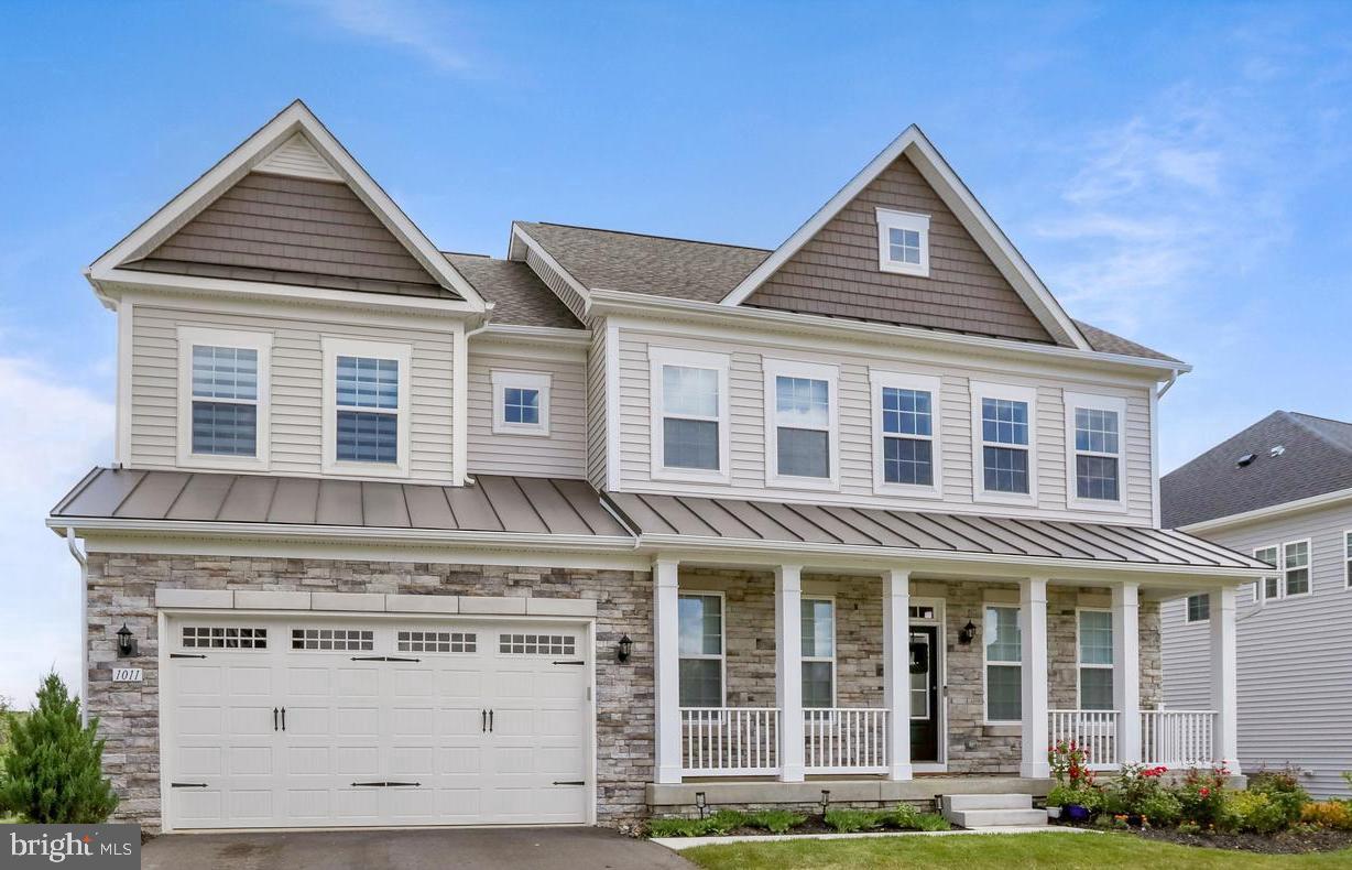 Welcome to 1101 Monocacy Crossing Parkway, a beautifully upgraded home in the sought-after Brunswick Crossing community. Offering over 3500 square feet of finished living space, this residence combines thoughtful design, elegant finishes, and flexible functionality—showing like a model from top to bottom.
Wide-plank luxury vinyl flooring flows throughout the home, lending warmth and continuity across all levels. The main level offers an open-concept layout with generous natural light and well-defined living and dining areas. The kitchen is the heart of the home, featuring quartz countertops, black stainless steel appliances, upgraded cabinetry, and an expansive center island perfect for gathering. Tucked quietly on this level is a private en suite bedroom, ideal for guests, multi-generational living, or a dedicated home office with added comfort.
Upstairs, the spacious primary suite offers a peaceful retreat with a walk-in closet and spa-like en suite bath complete with separate vanities, a soaking tub, and a separate oversized shower. Three additional bedrooms complete the upper level—one with its own private en suite bath, and two that share a full hall bath. A dedicated laundry room is also located upstairs for added convenience.
The unfinished basement offers abundant potential for future customization or additional storage which also walks outside to the rear yard.
Step outside to a rear deck overlooking an open backyard—perfect for outdoor dining, morning coffee, or peaceful evenings at home.
As a resident of Brunswick Crossing, you’ll enjoy access to resort-style amenities including a pool, clubhouse with fitness center and lounge, tennis and basketball courts, beach volleyball, dog parks, tot lots, over 26 miles of walking trails, and more than 100 acres of green space. On-site retail and a grocery store add everyday convenience, while community events foster a true neighborhood feel.
Ideally situated just minutes from the MARC train station and major routes including Route 340, Route 15, and I‑270, this location offers a smooth commute to Frederick, Northern Virginia, and beyond. Dulles International Airport is under an hour away, and local attractions like Harpers Ferry, the C&O Canal, and historic downtown Brunswick are right at your fingertips.
1101 Monocacy Crossing Parkway offers the perfect blend of style, space, and setting—an exceptional opportunity in one of Frederick County’s most vibrant and well-connected communities.