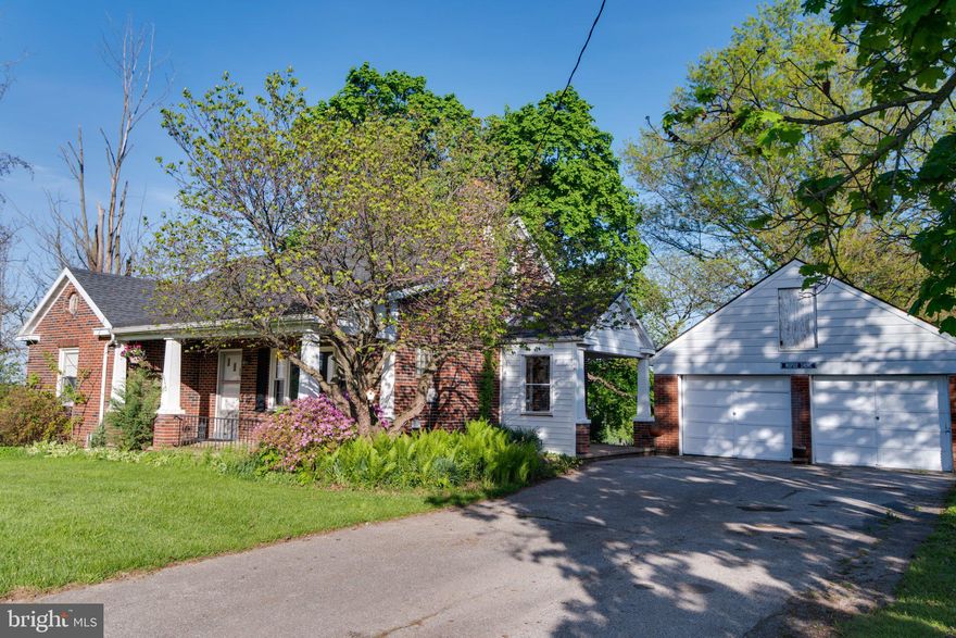 Charming Brick Cape Style home with an Amazing 3 Car+ Garage in Dover. 
You've got to see this solidly built and well-maintained brick Cape offering comfort, convenience, and plenty of potential. The real star of the property may be the oversized garage & workshop with lots of storage and 3-4 car bays. Ideal for car enthusiasts, hobbyists, or anyone needing extra storage or workspace.
 All of this, and situated on a large level yard in the rural setting of Dover. It's easy to see how this location and road got its name!

Inside the home, you'll find 2 of the 3 bedrooms and a Full bath on the main floor, ensuring this home lives like a classic ranch, providing a one-level lifestyle. Yet upstairs you'll find additional rooms and storage. This clean, functional layout also provides bright living spaces and so much potential. The living room with its front picture windows and fireplace, the rear dining room, and the kitchen open to the side porch. While many finishes are original, the home has been lovingly cared for and is move-in ready — providing a perfect opportunity for buyers who want a quality home today with the option to add modern updates over time.

This home combines timeless charm with room to grow — whether you choose to enjoy it as-is or update to match your personal style. Come see this property and all that Paradise Road has for you.