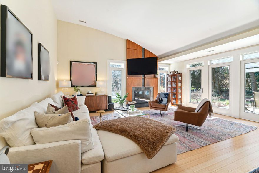 Welcome to 7616 Huron Street, an architecturally thoughtful and very functional one level home, beautifully situated on a lovely private lot in a very desirable Chestnut Hill location. This home was completely renovated in 2004, transforming this space into a home with incredible light filled rooms and modern design elements throughout. Welcoming entry foyer leads to an open and bright living and dining area with a gas fireplace plus dramatic vaulted ceilings, skylights, walls of windows and doors overlooking the tranquil patio and garden. This space is open to the Chef’s kitchen which includes custom cabinets, butcher block and granite counter tops, Dacor wall oven plus a microwave/convection oven, Wolf gas cooktop, Sub-Zero refrigerator and a breakfast bar. Just down the hall you will find an expansive Primary suite oasis including a large bedroom plus a sitting area or office area. This lovely room has wonderful garden views through the many windows and doors. 2 walk-in closets with custom closet built-ins. Each closet has its own entry into a separate vanity toilet area and is connected by an oversized double sided shower. A 2nd bedroom suite with dressing area, great closet spaces and its own bathroom make this the perfect room for guests. The two rooms at the front of the home could serve as a 3rd bedroom and sitting area or office space. Property can be restored into a four bedroom by converting current sitting room next to bedroom 3. Continuing on to the basement and the garage, you will find an open pantry/storage area, built-in cabinetry and a mudroom. The basement includes a full bathroom and exterior access. This could be a great space for a media room/play room/home gym/home office. Light hardwood floors plus first floor laundry and powder room, generator, a greenhouse, 2 car garage with interior access and skylights throughout. The garden is very private with a pool. Entertain and enjoy the lovely Pergola covered flagstone patio with a gas grill connected to a gas line. Easy walk to Germantown Avenue commercial corridor, train station, Wissahickon trails and so convenient to Center City